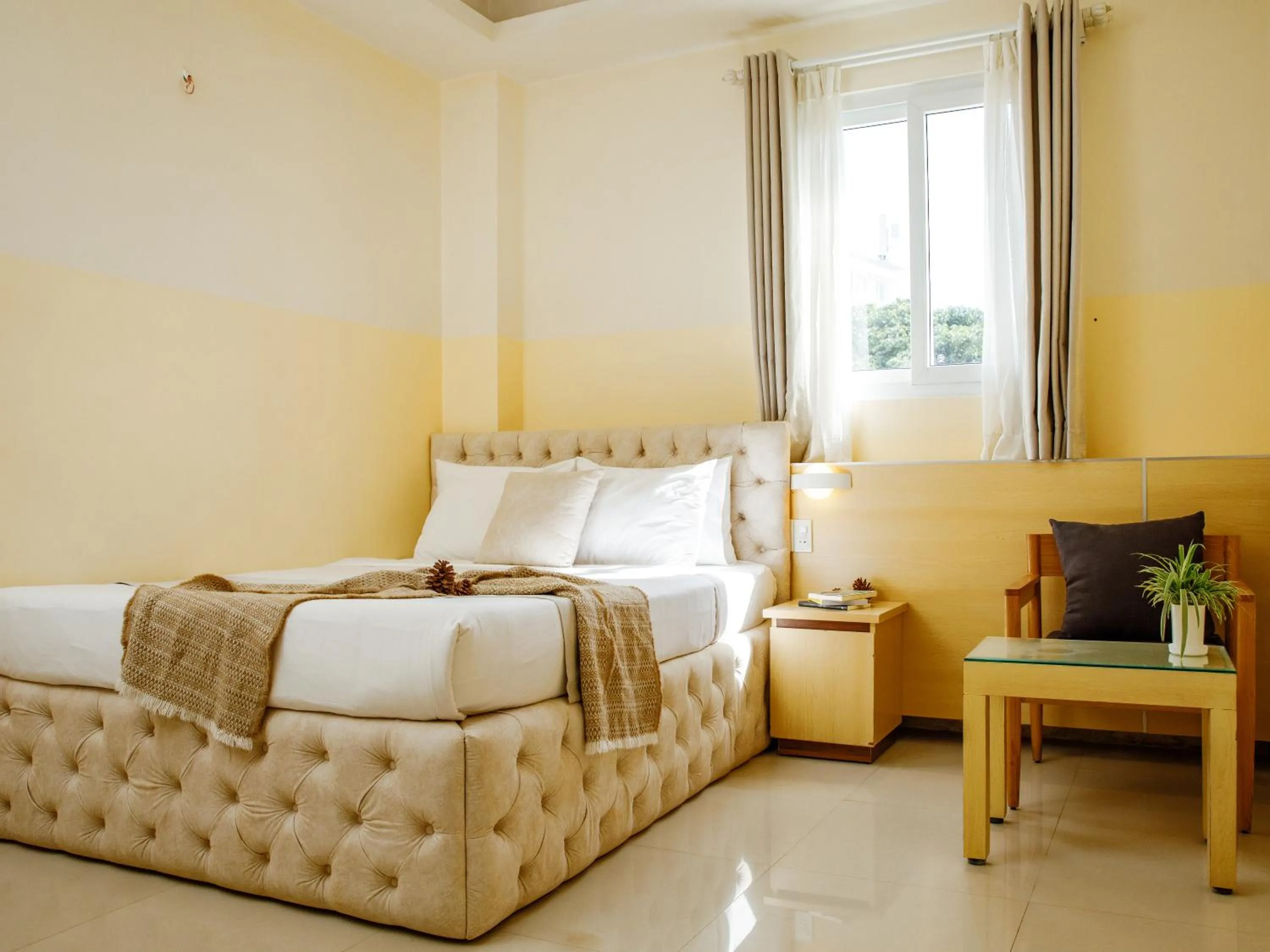 Photo of the whole room, Bed in Ngoc Nguyen Anh Hotel Da Lat