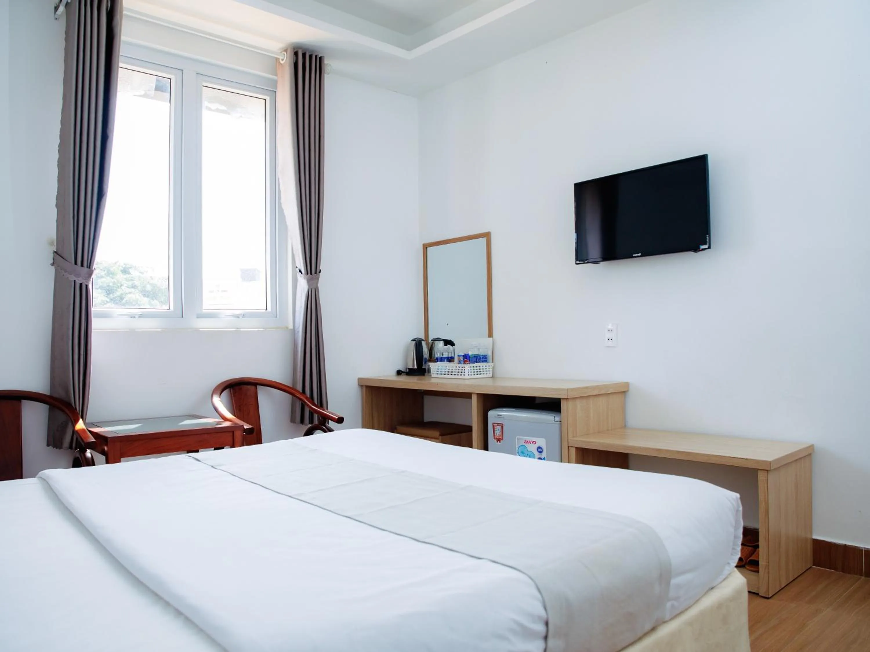 Bed in Ngoc Nguyen Anh Hotel Da Lat