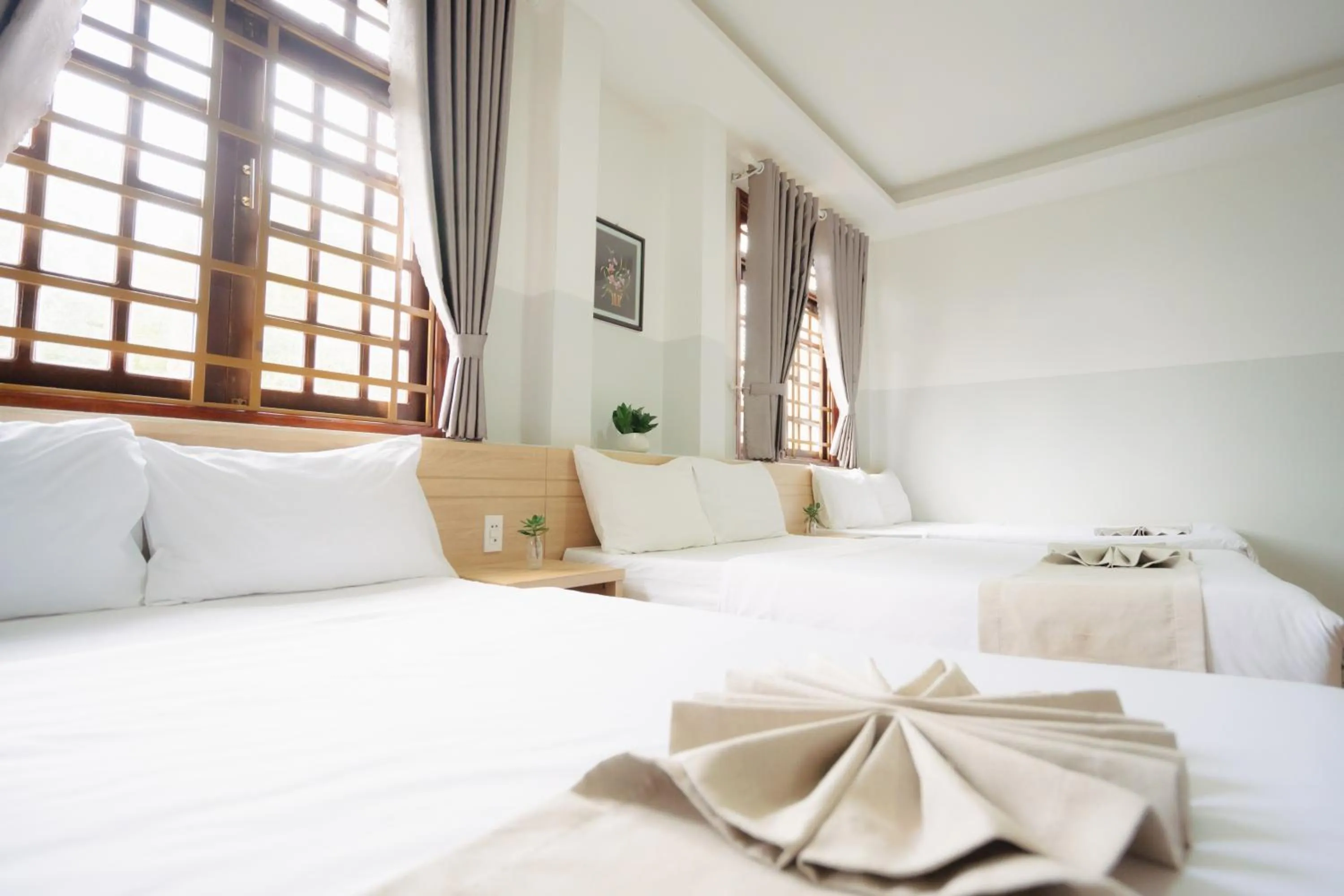 Bed in Ngoc Nguyen Anh Hotel Da Lat