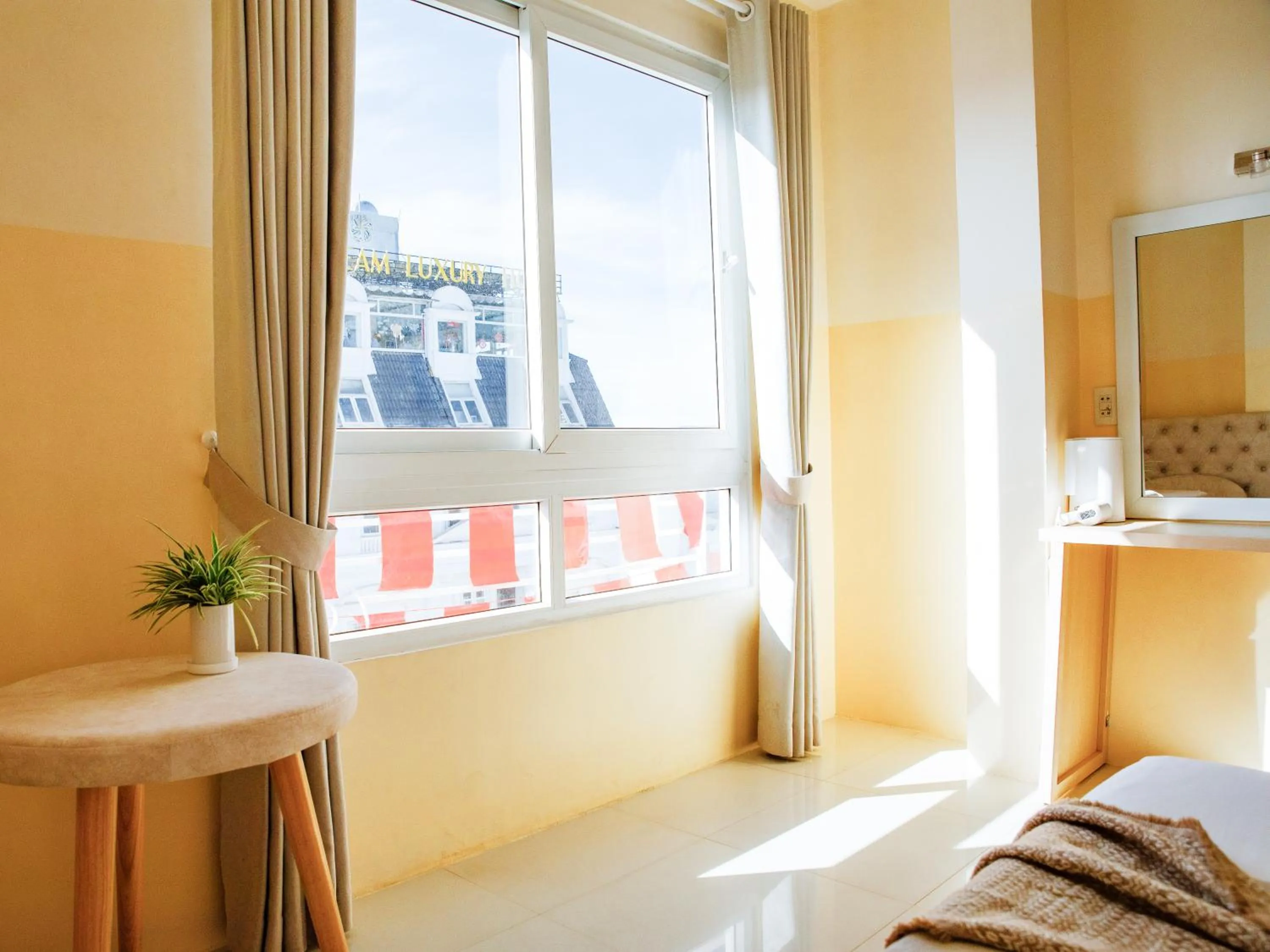 Photo of the whole room, Bed in Ngoc Nguyen Anh Hotel Da Lat