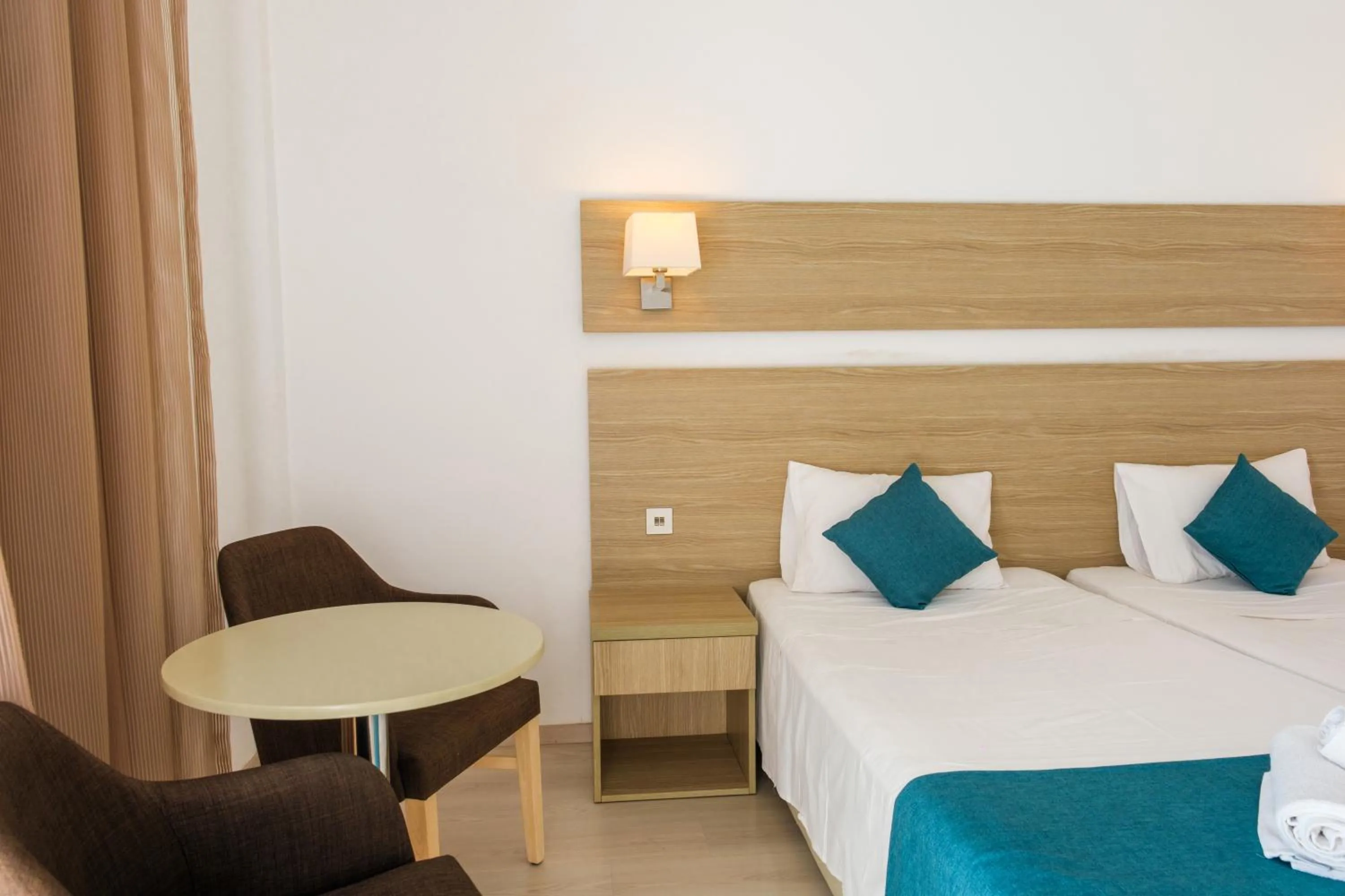 Photo of the whole room, Bed in Kapetanios Bay Hotel Protaras