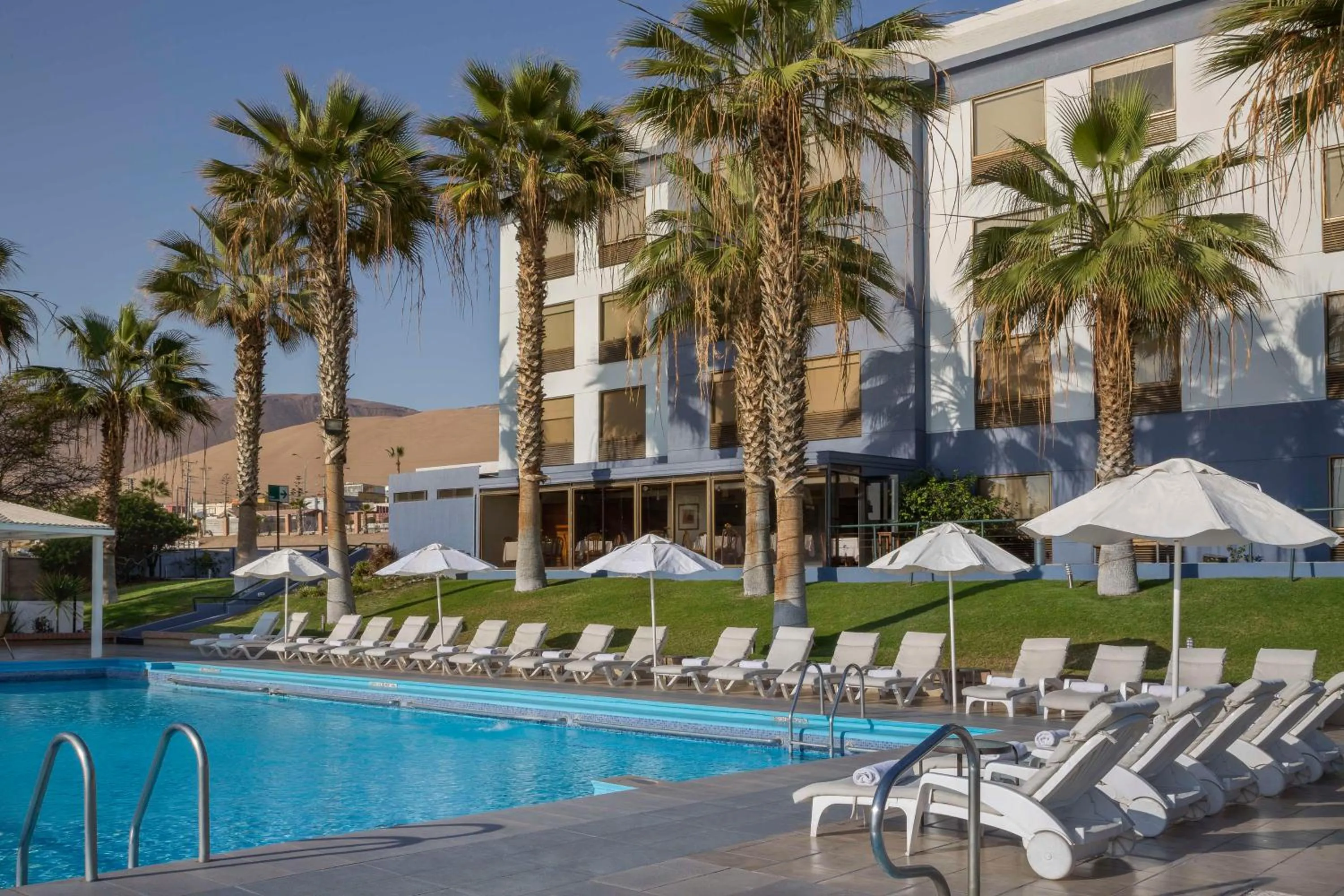 Pool view in NH Iquique Costa
