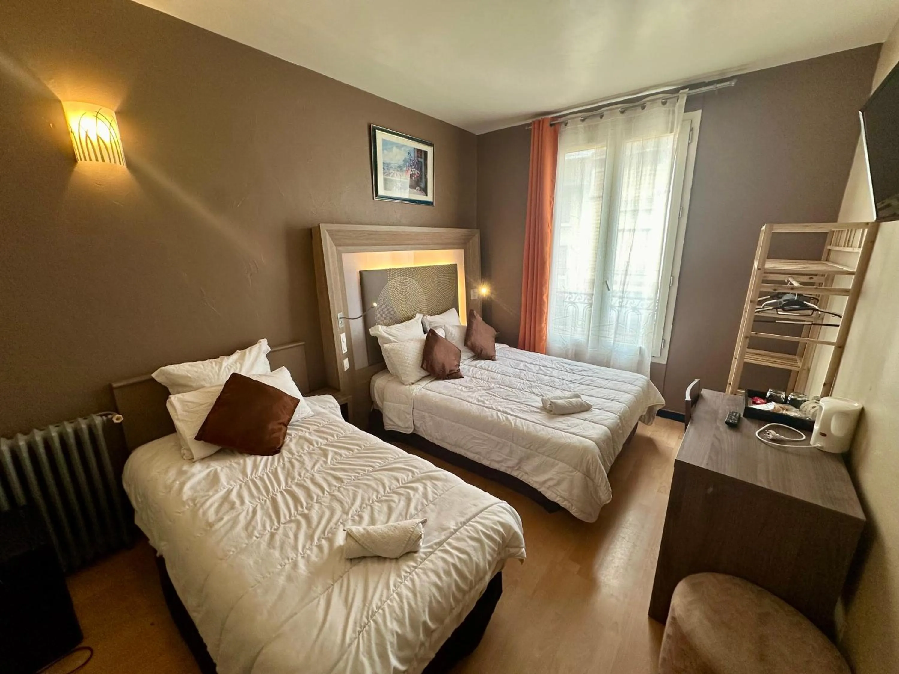 Bed in Hotel Victor Hugo