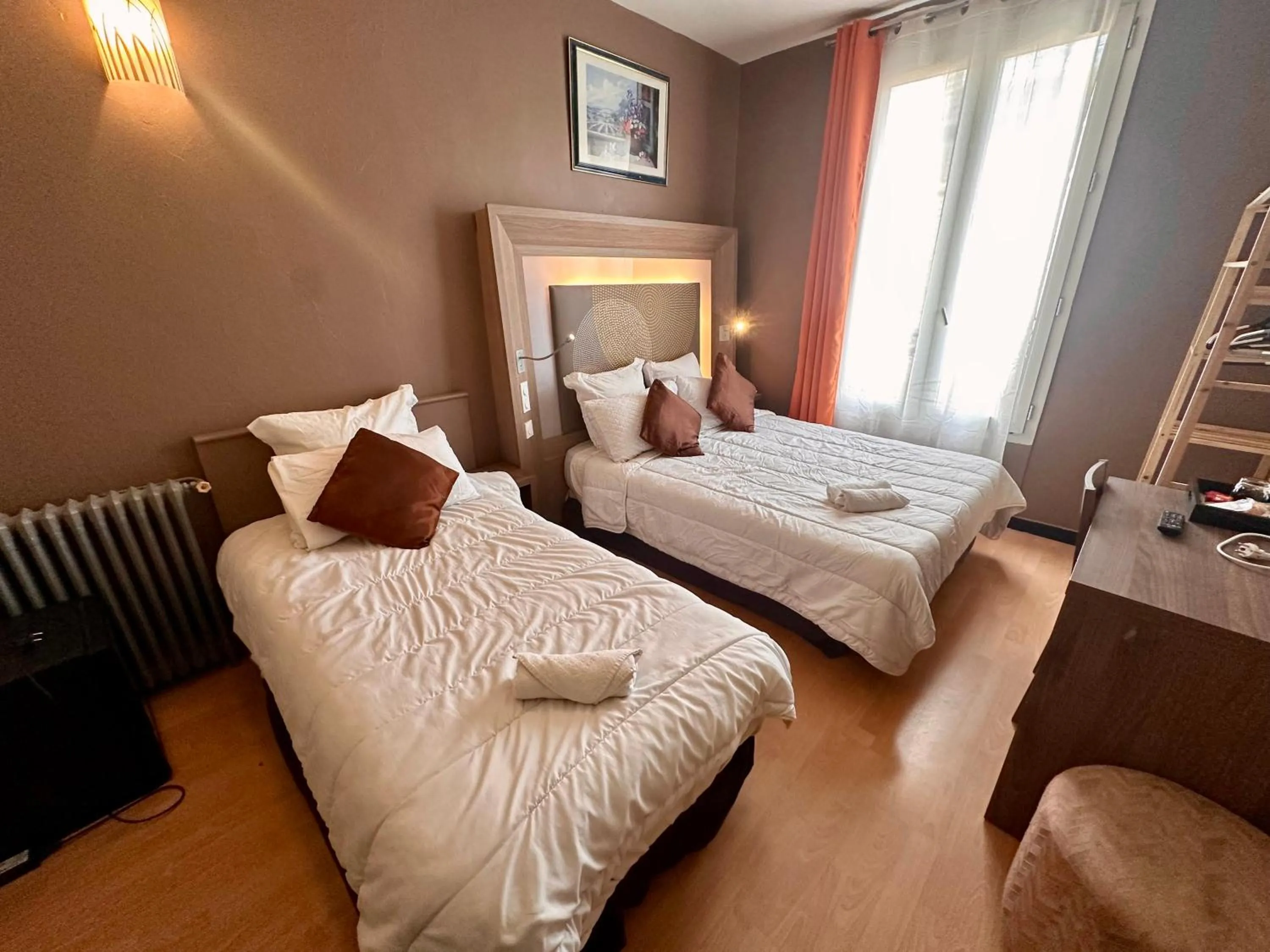 Bed in Hotel Victor Hugo