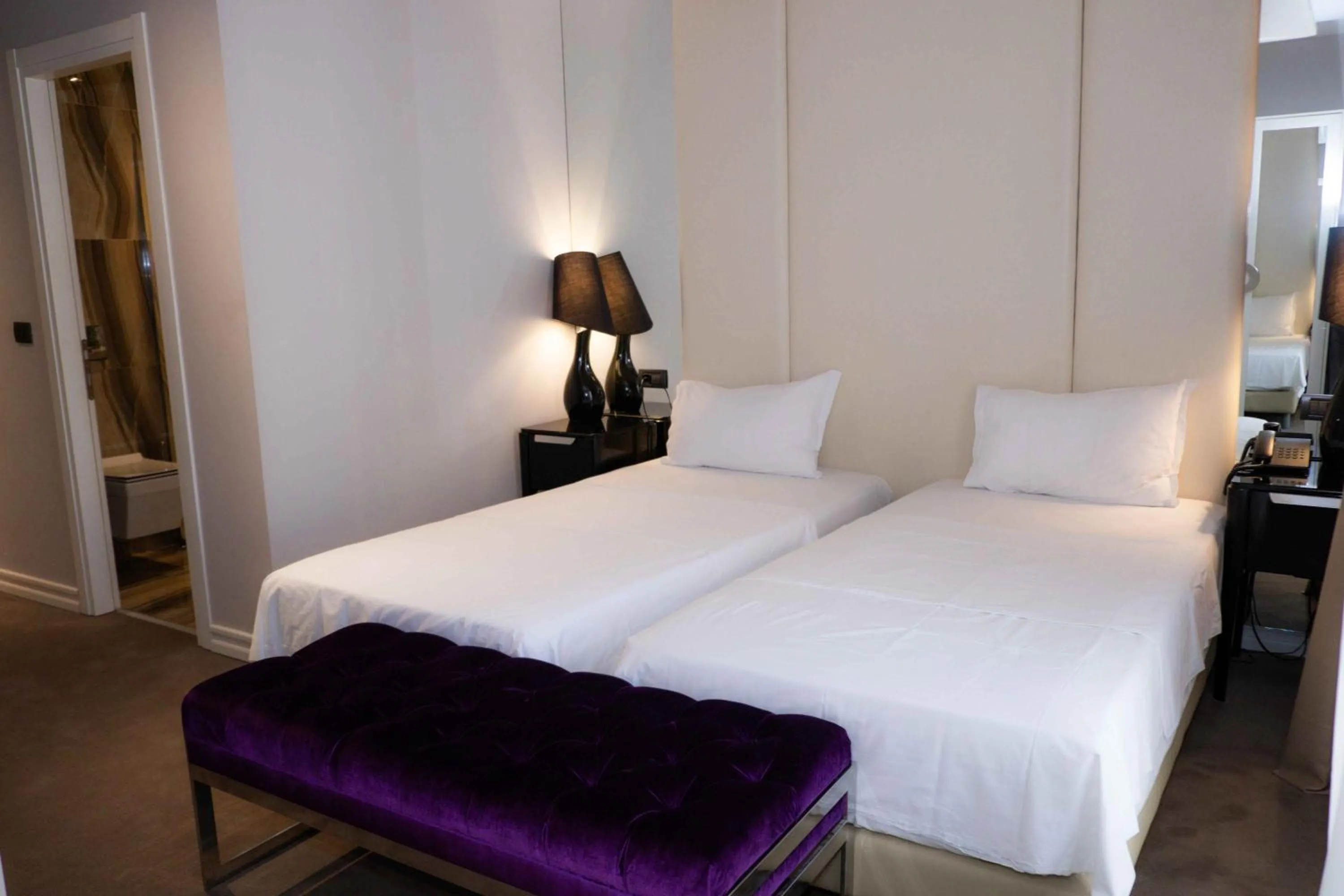 Bed in Senator Hotel