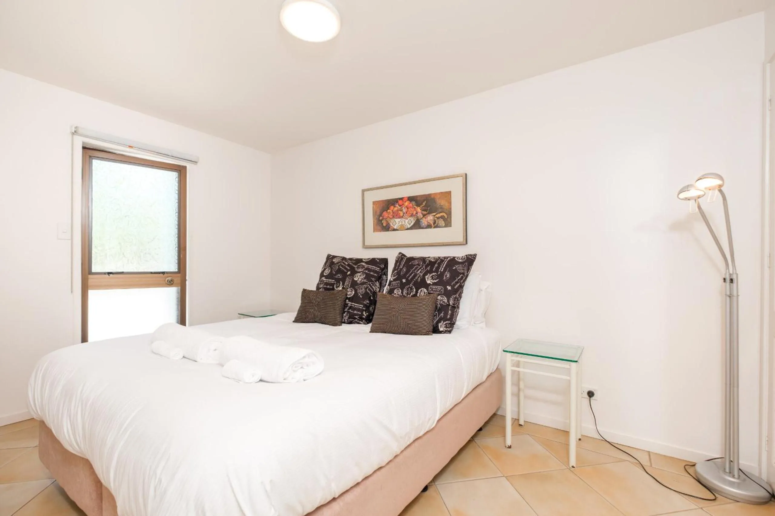 Bed in Onetangi Beach Apartments
