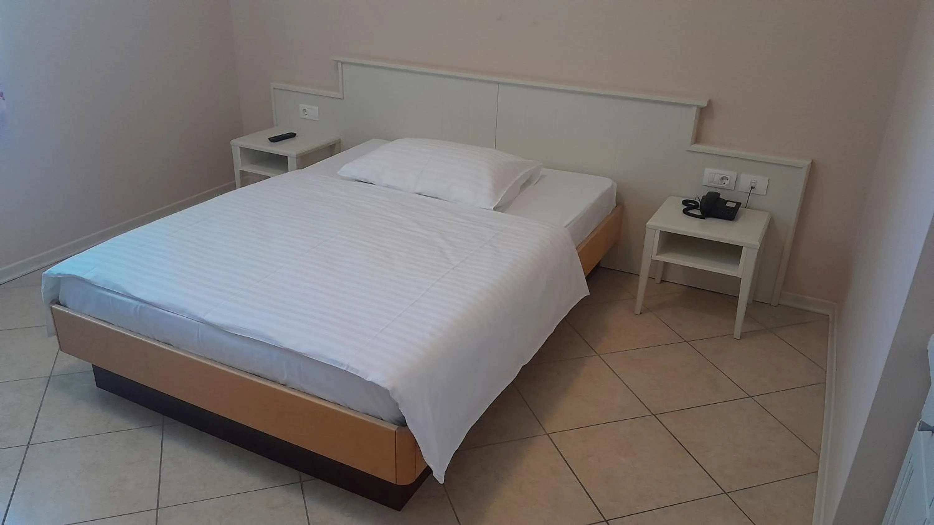 Bed in Hotel Kozana