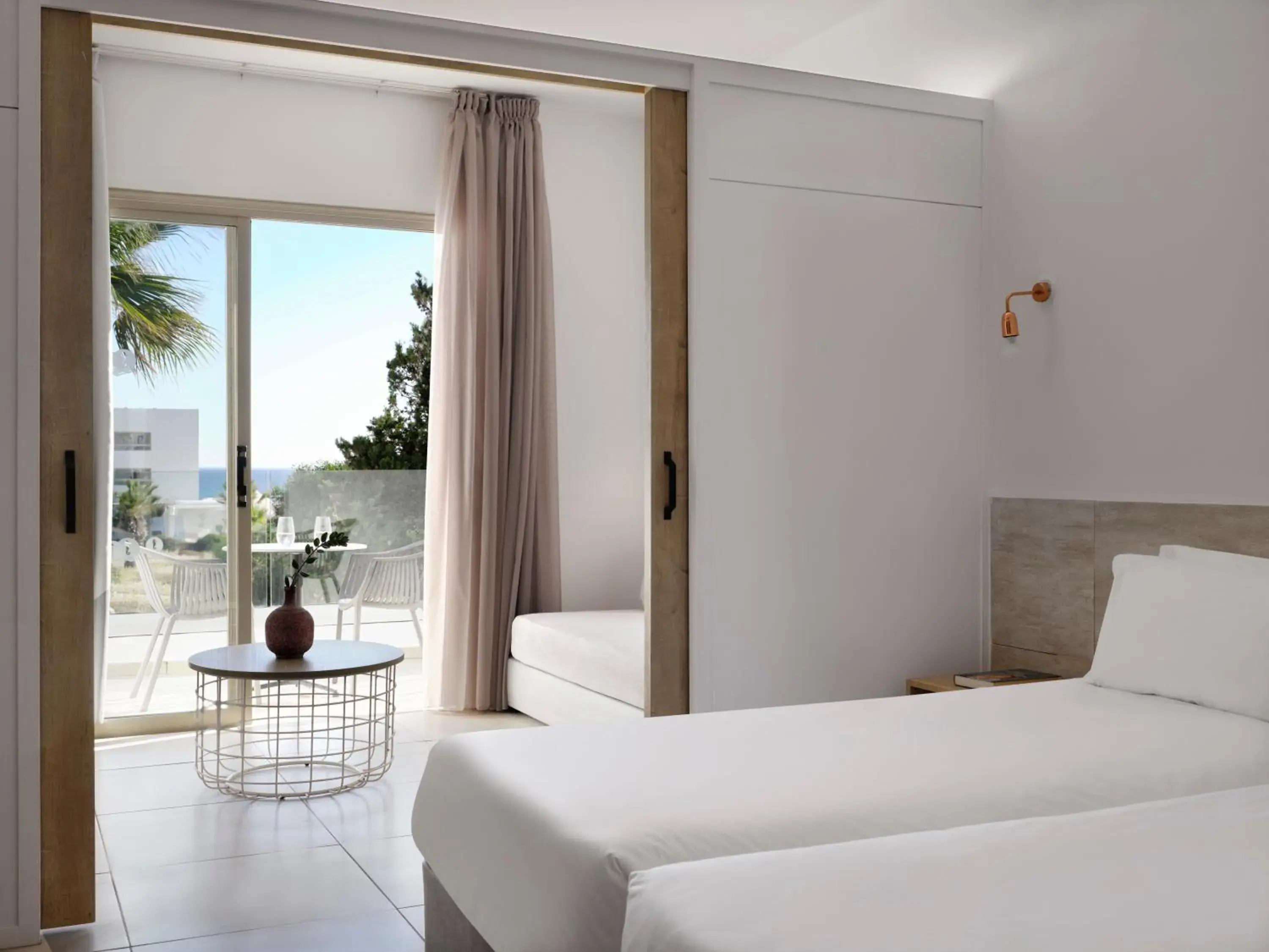 Family Room with Side Sea View in Atlantica Panthea Resort Family Room with Side Sea View in Atlantica Panthea Resort