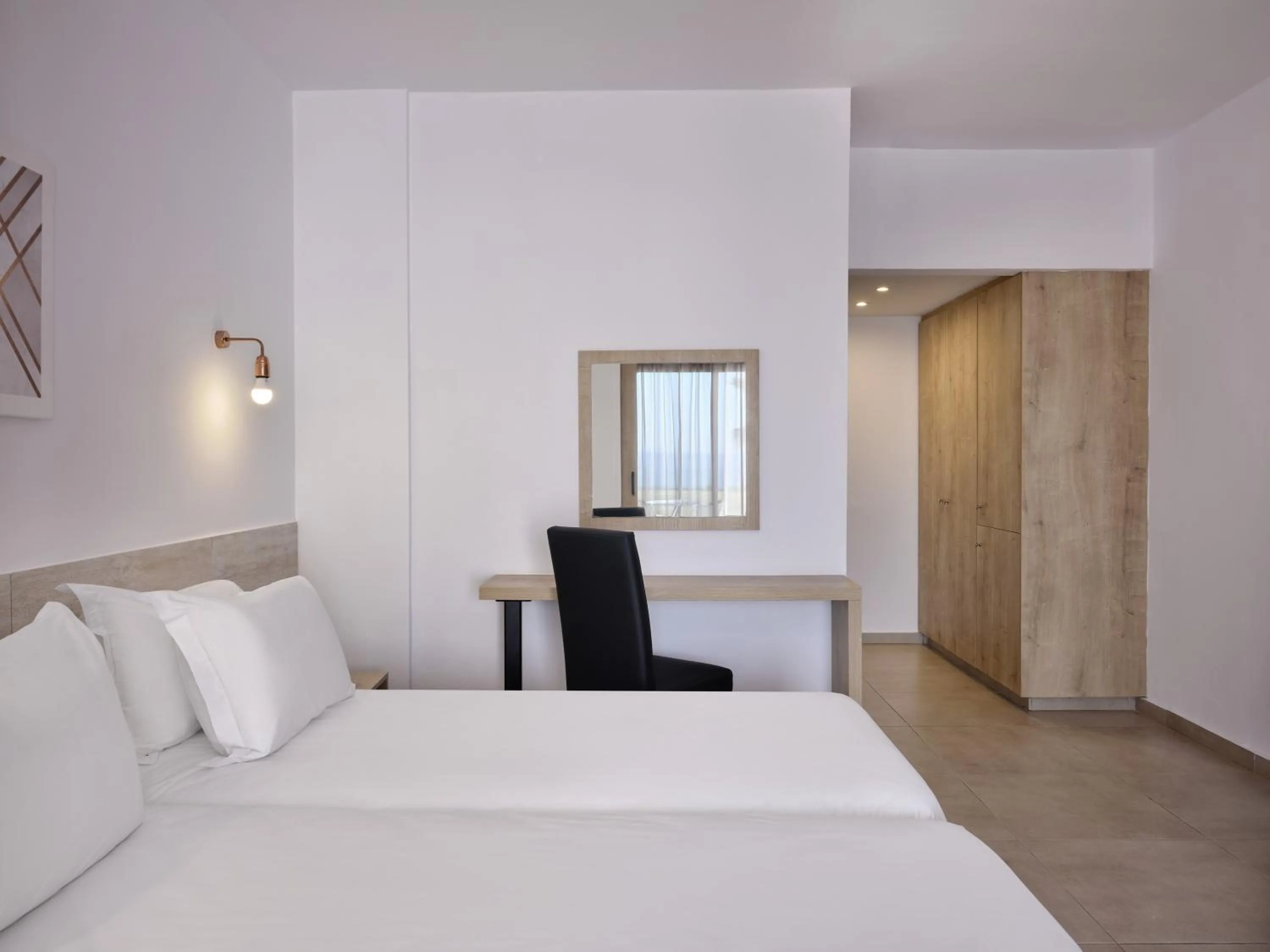 Bed in Atlantica Panthea Resort