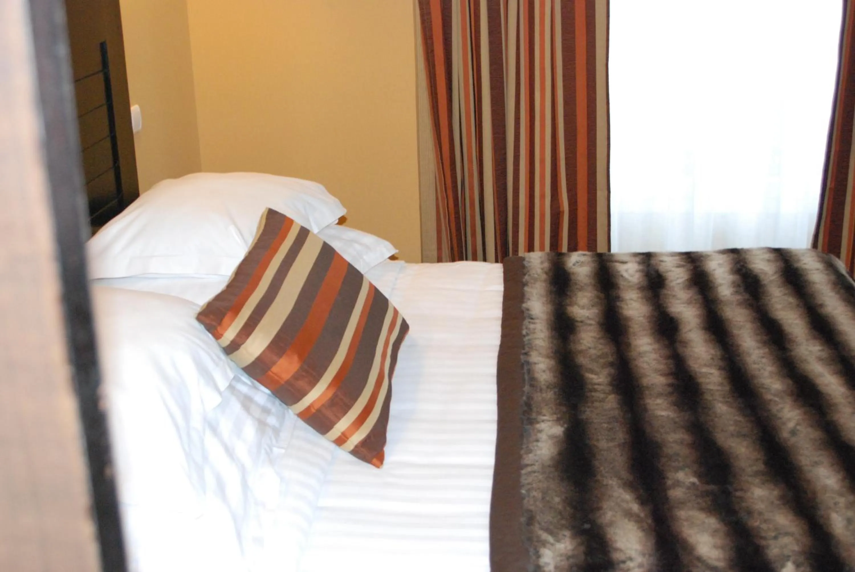 Bed in Hôtel Ariane & SPA