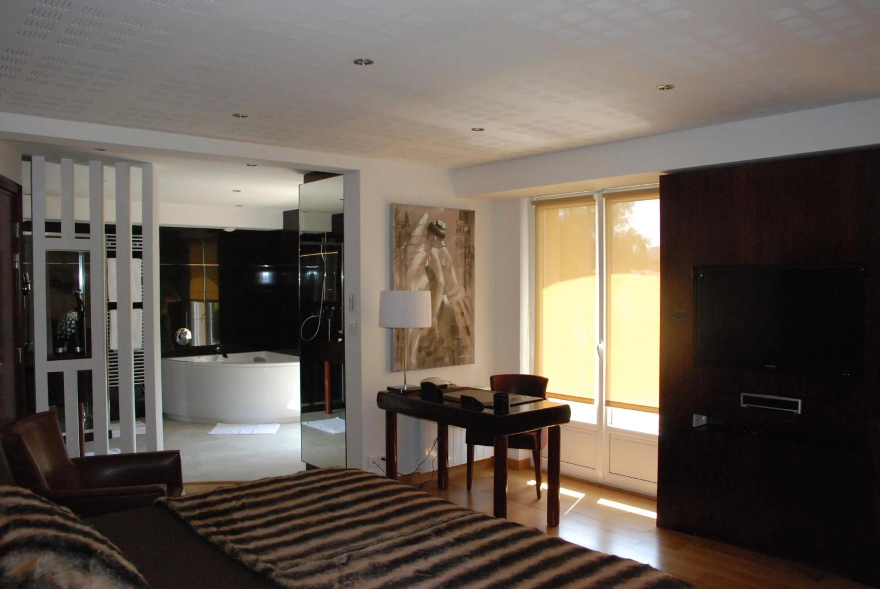 Bathroom in Hôtel Ariane & SPA