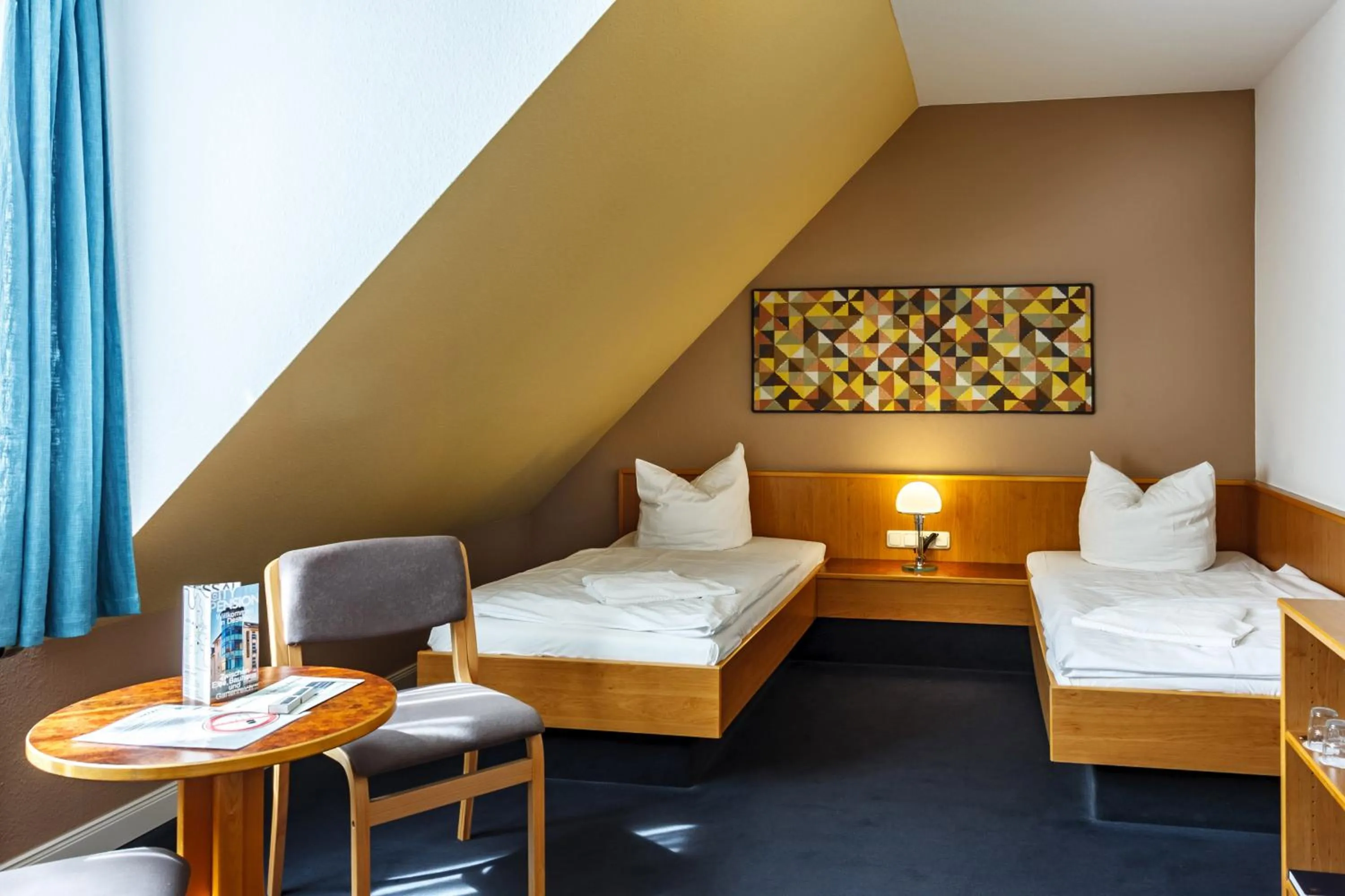 Photo of the whole room, Bed in City-Pension Dessau-Roßlau