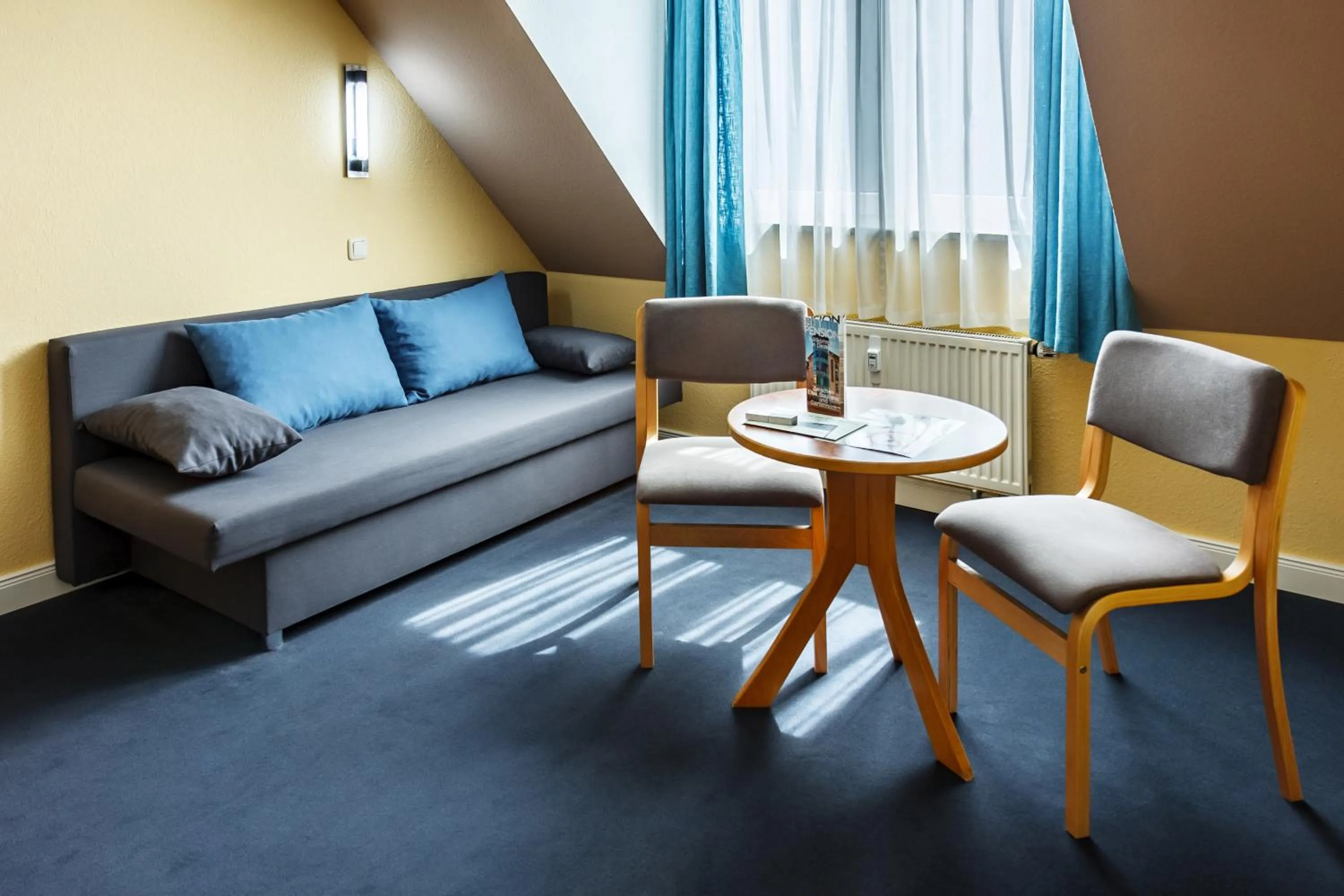 Seating area in City-Pension Dessau-Roßlau