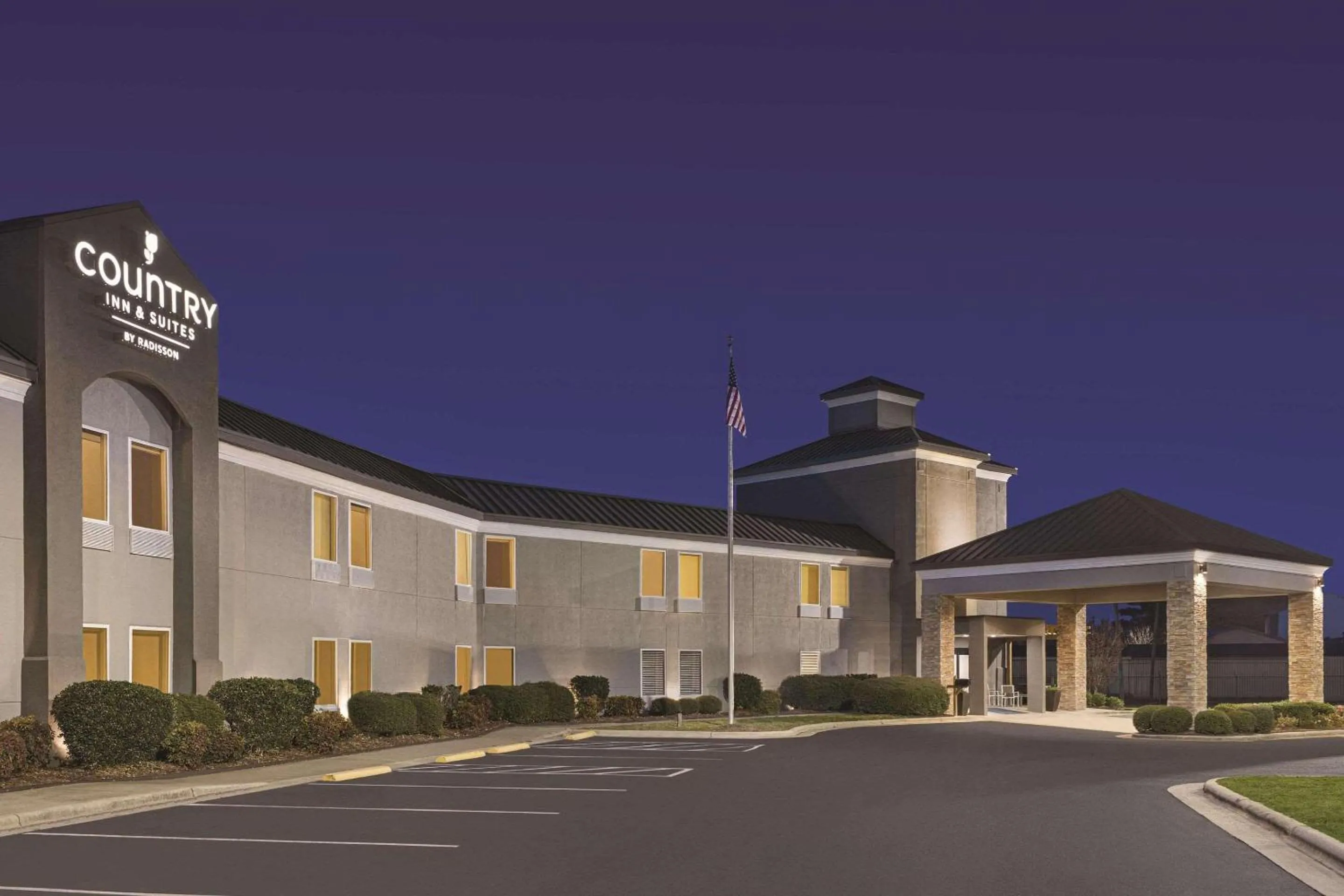Property building in Country Inn & Suites by Radisson, Dunn, NC