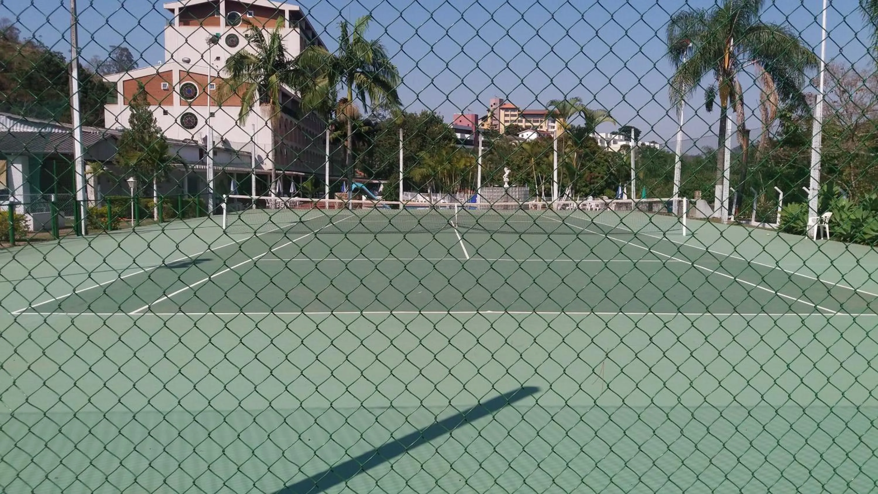 Tennis court in Apartamento Hotel Cavalinho Branco