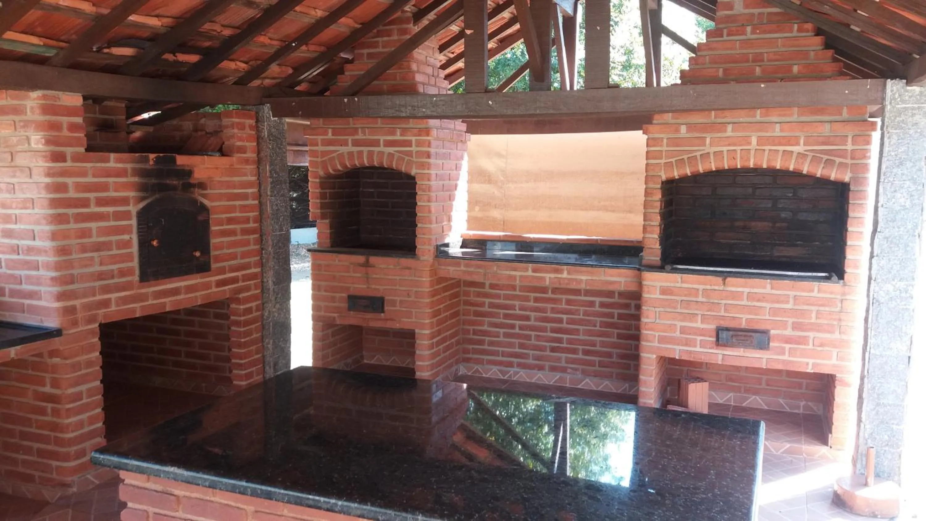 BBQ facilities in Apartamento Hotel Cavalinho Branco