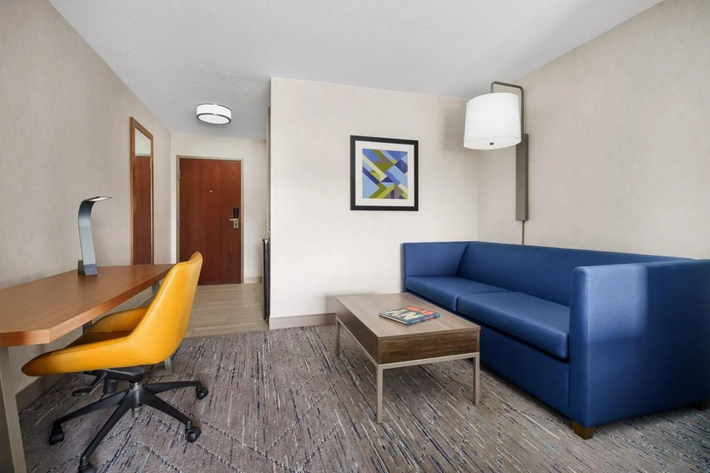 Living room in Holiday Inn Express Irondequoit by IHG