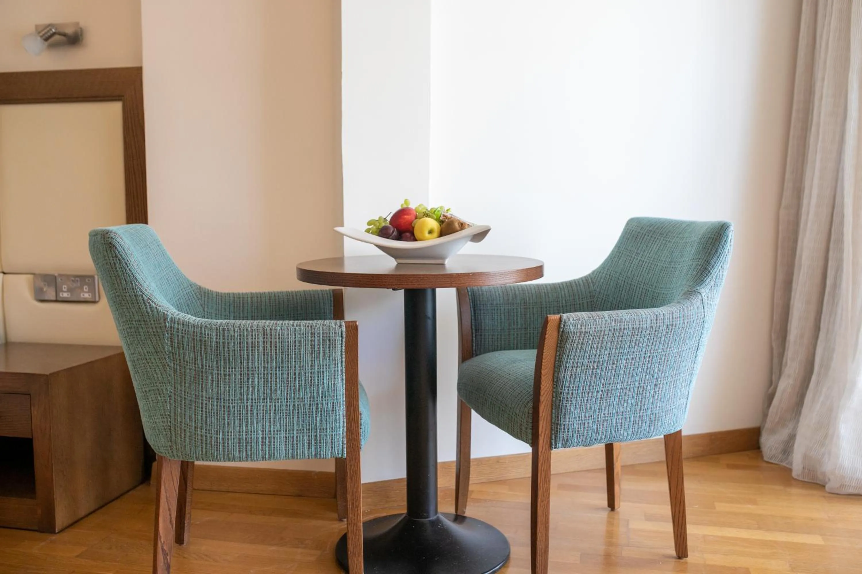 Living room in Golden Bay Beach Hotel