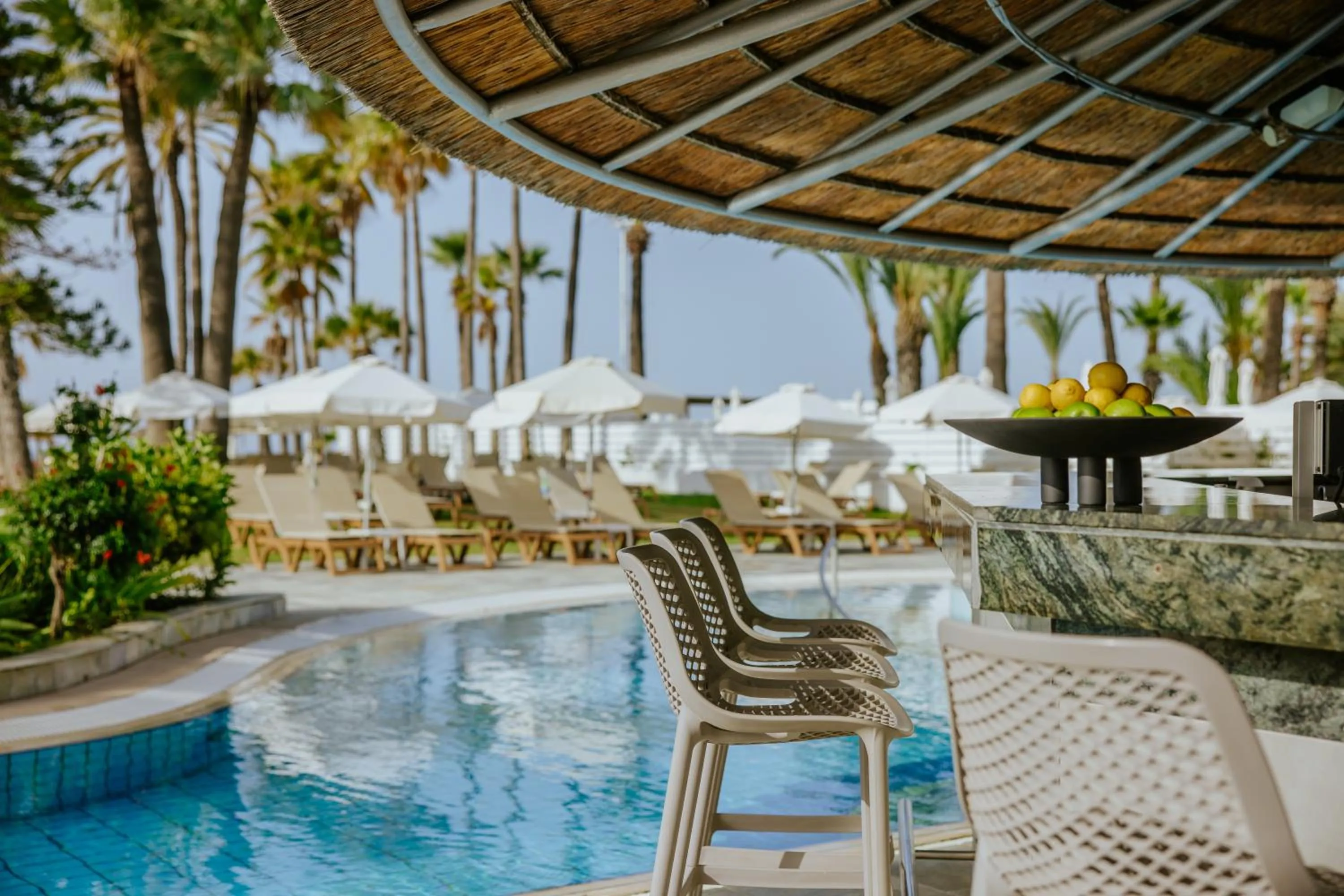 Lounge or bar in Golden Bay Beach Hotel