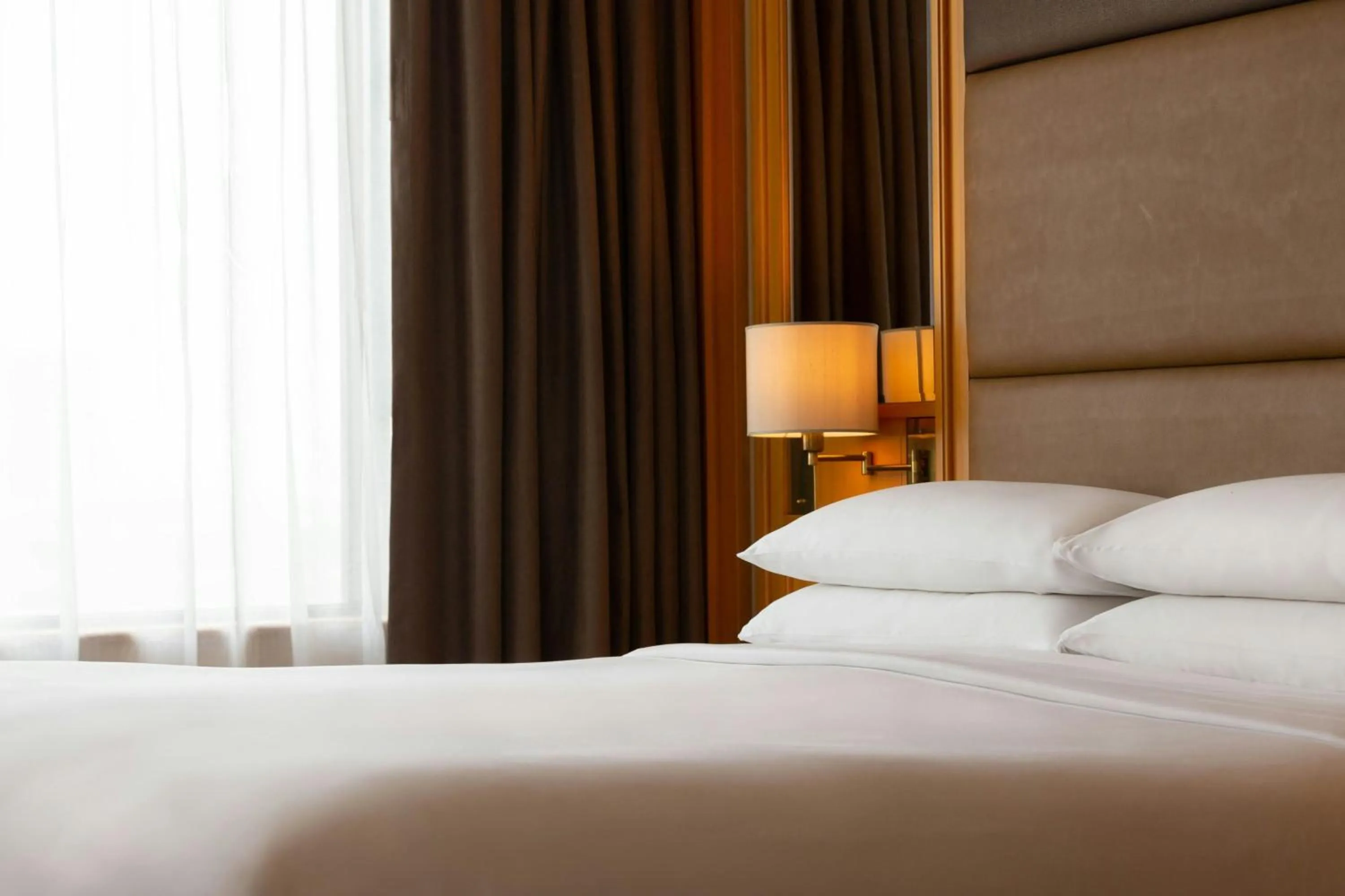 Photo of the whole room, Bed in Renaissance Riverside Hotel Saigon