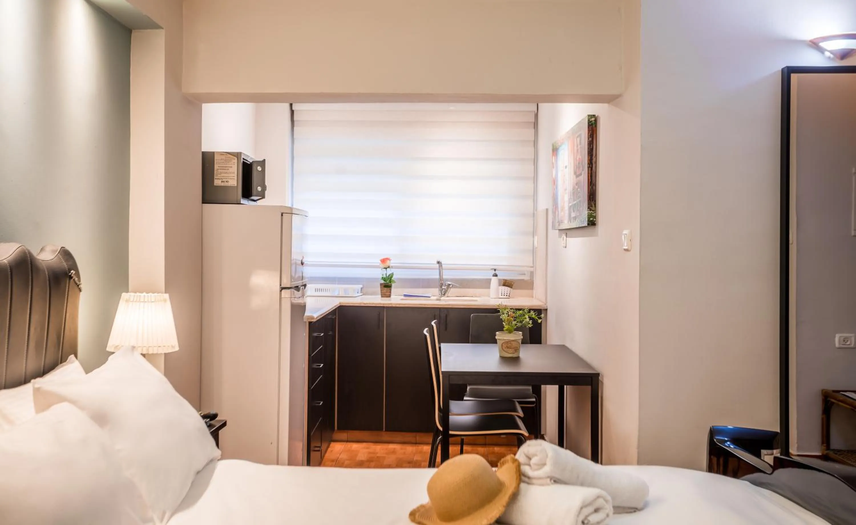 Kitchen or kitchenette, Bed in Avital Hotel