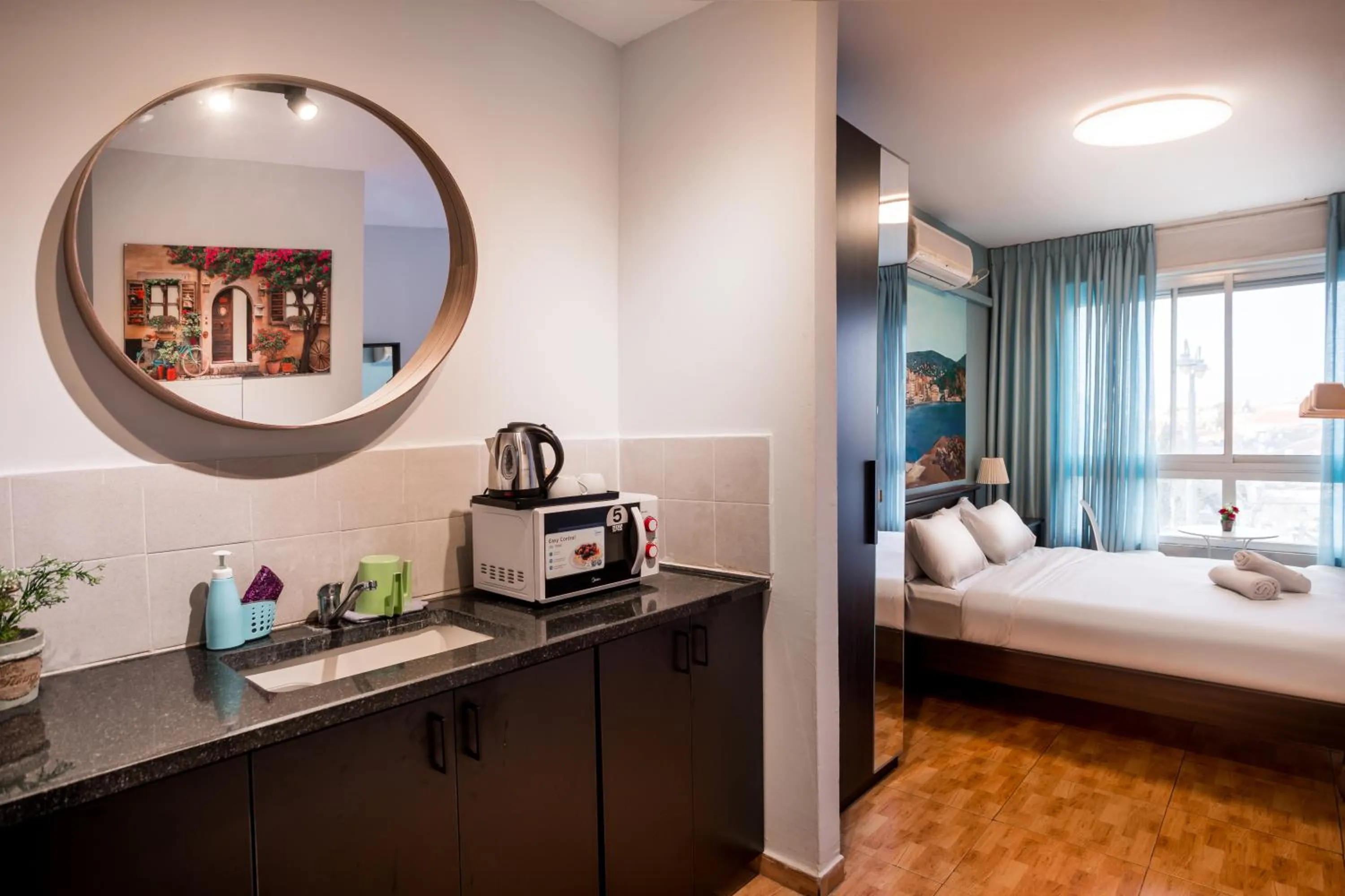 Kitchen or kitchenette, Bed in Avital Hotel