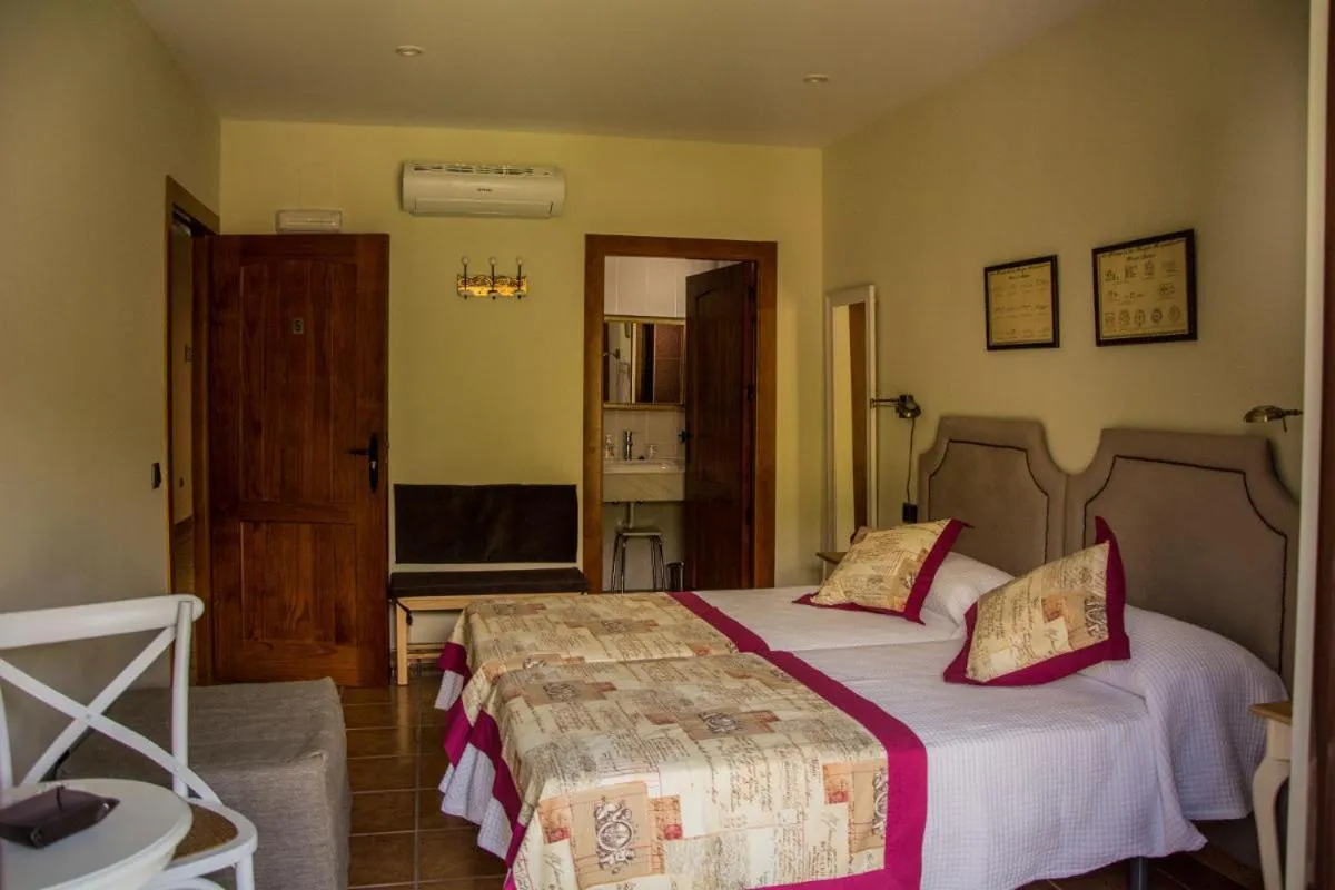 Bed in Casa Rural Fuente El Boticario