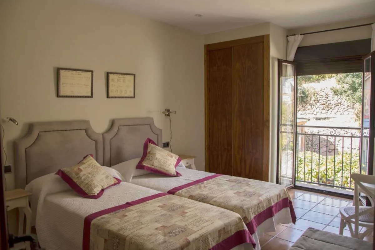 Bed in Casa Rural Fuente El Boticario