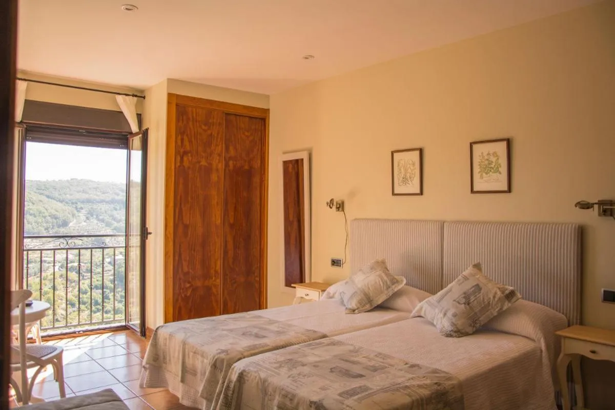 Bed in Casa Rural Fuente El Boticario