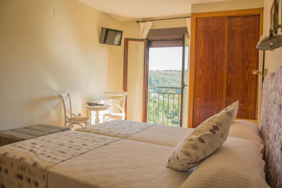 Bed in Casa Rural Fuente El Boticario