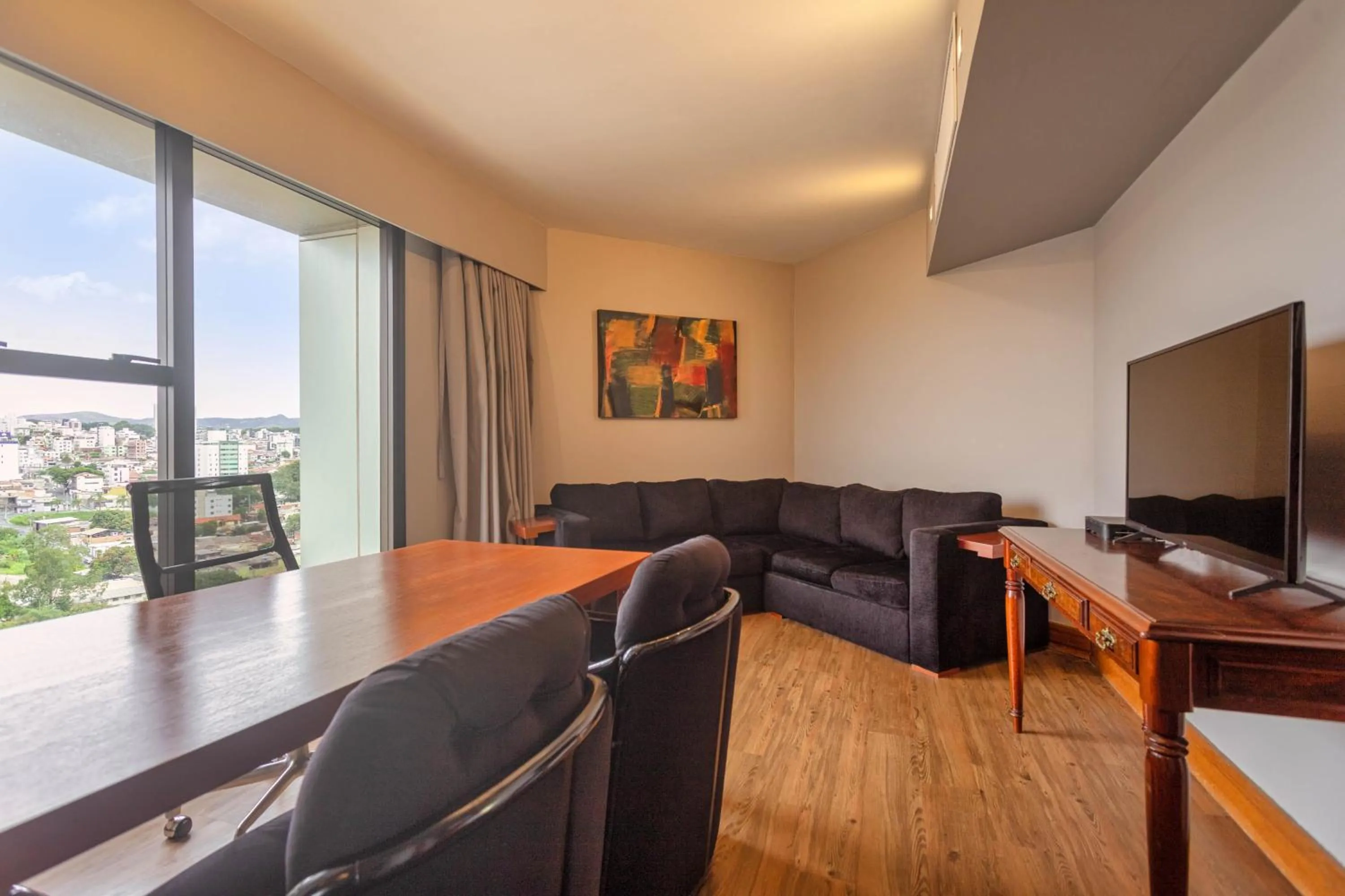 Living room in Ouro Minas Hotel Belo Horizonte, Dolce by Wyndham