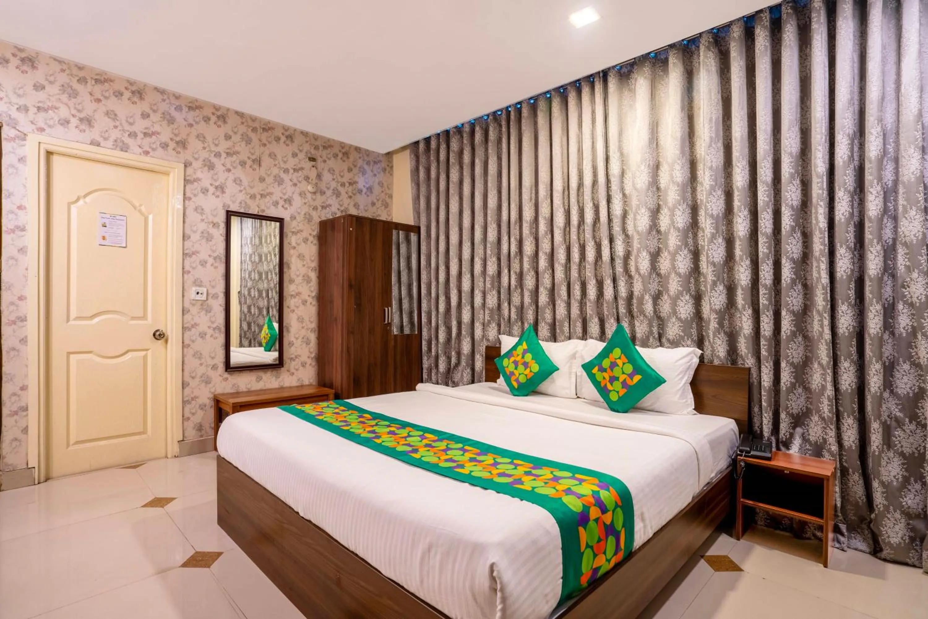 Bedroom, Bed in Treebo Srico, Banjara Hills