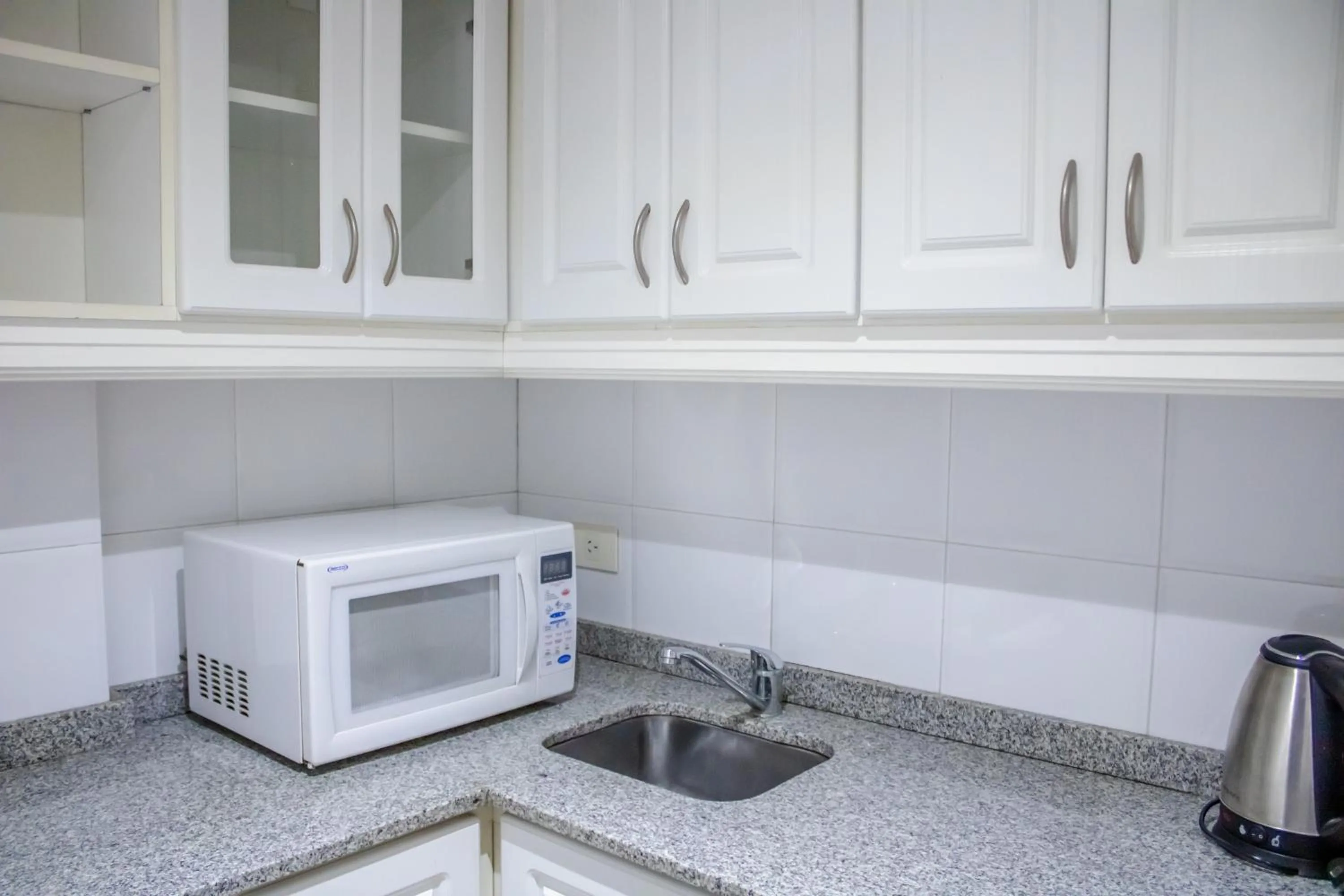 Kitchen or kitchenette in Ker Belgrano Hotel