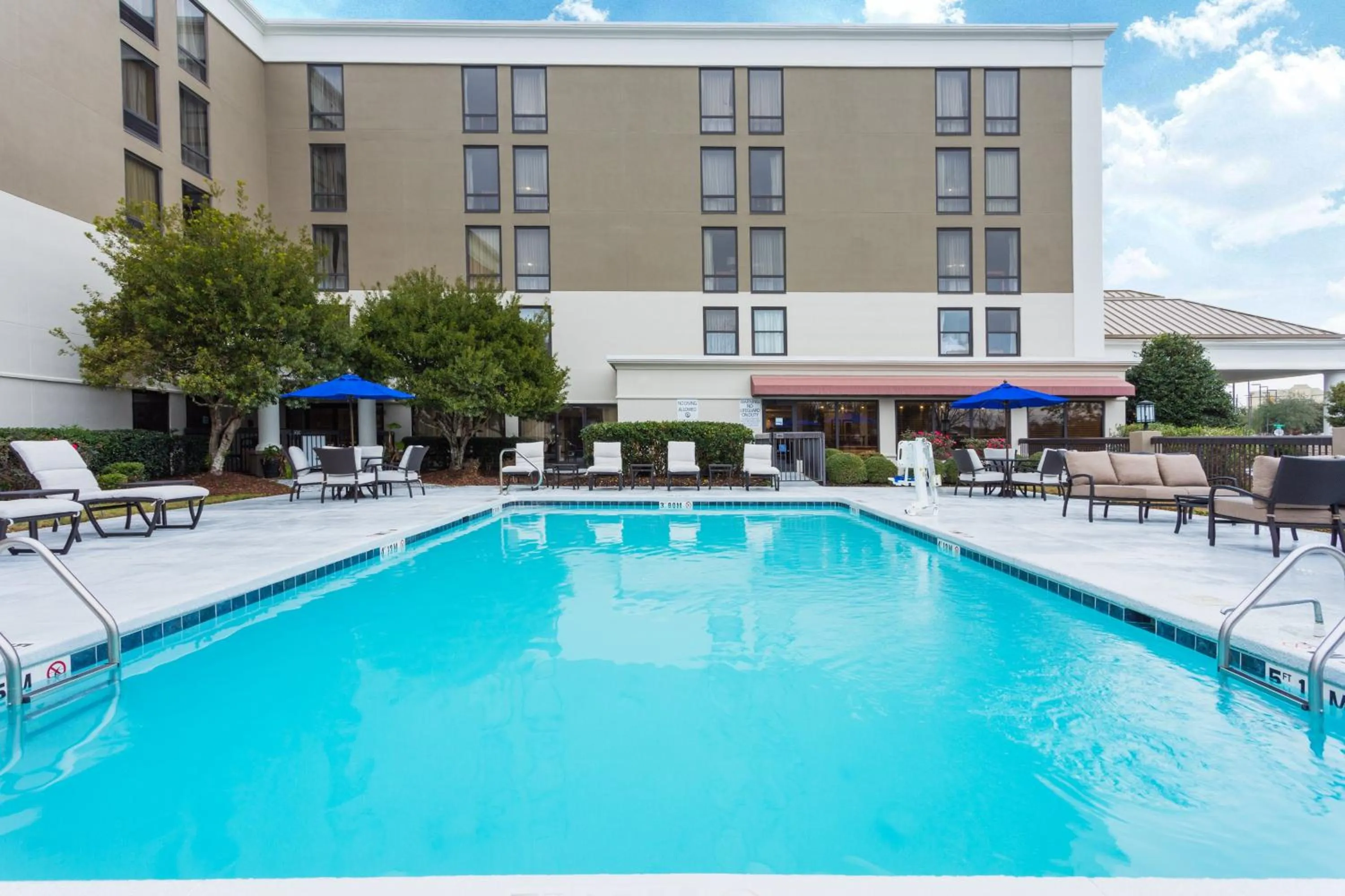 Swimming pool in Holiday Inn Express & Suites Wilmington-University Center by IHG