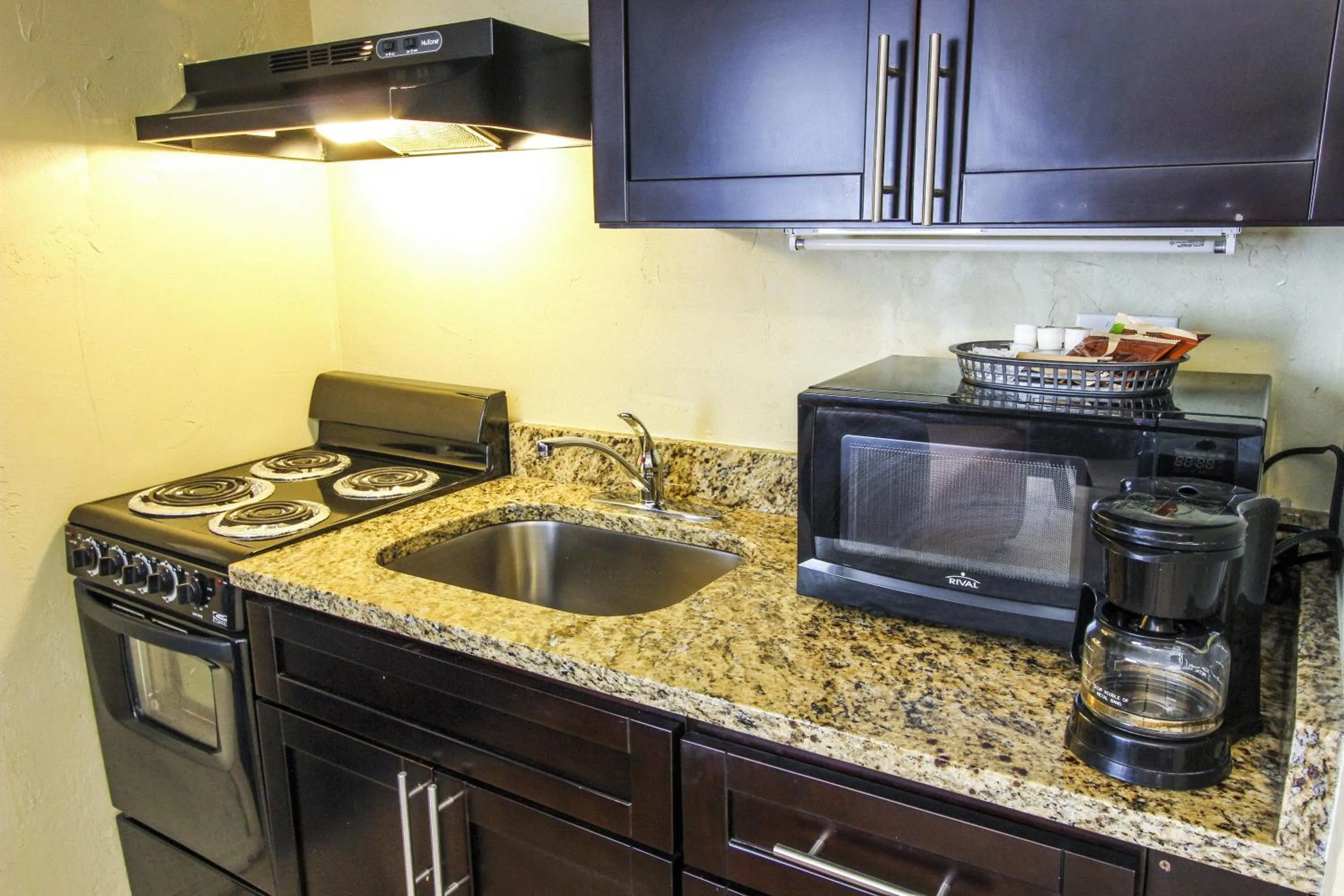 Kitchen or kitchenette in Oceans Beach Resort & Suites