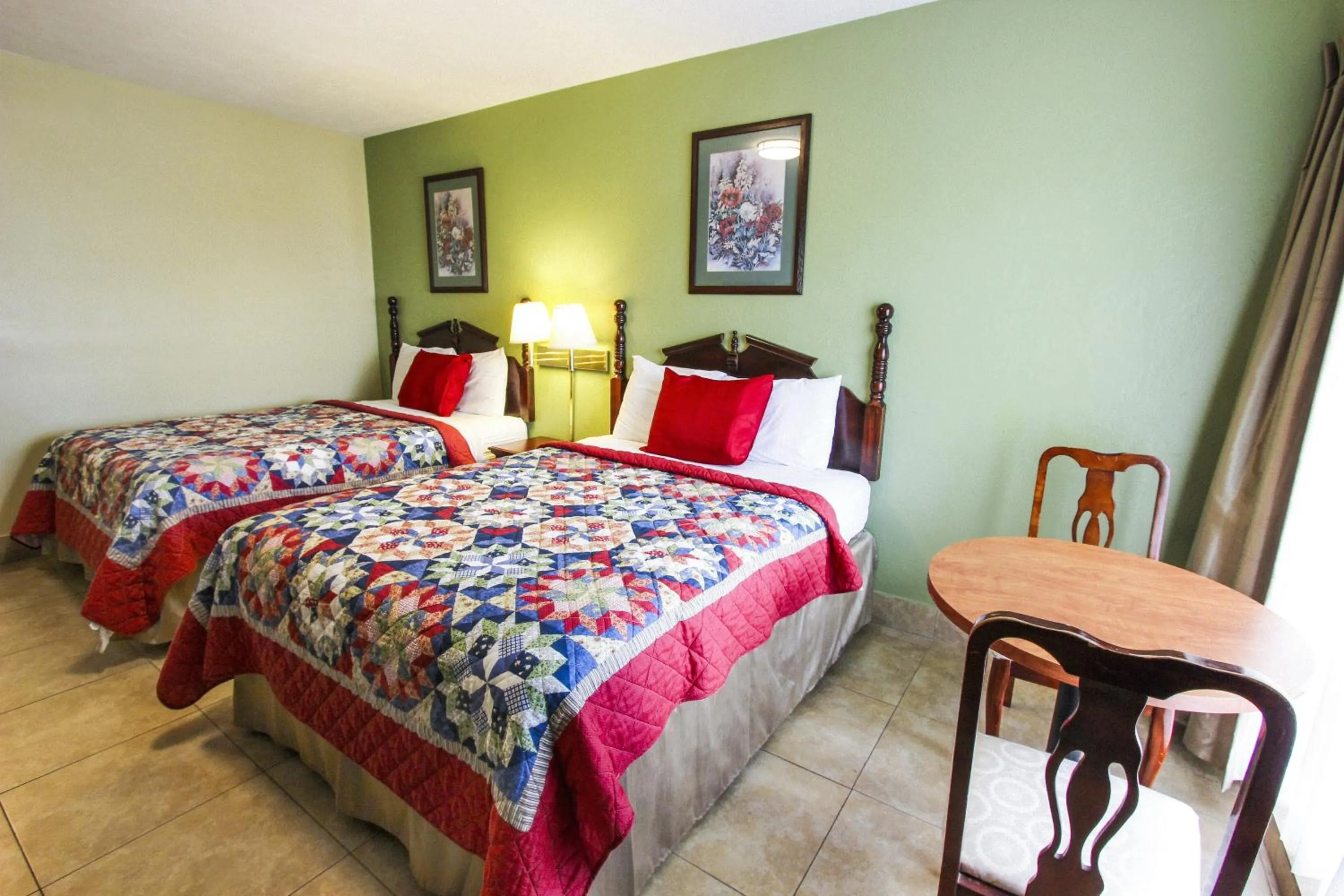 Bedroom, Bed in Oceans Beach Resort & Suites