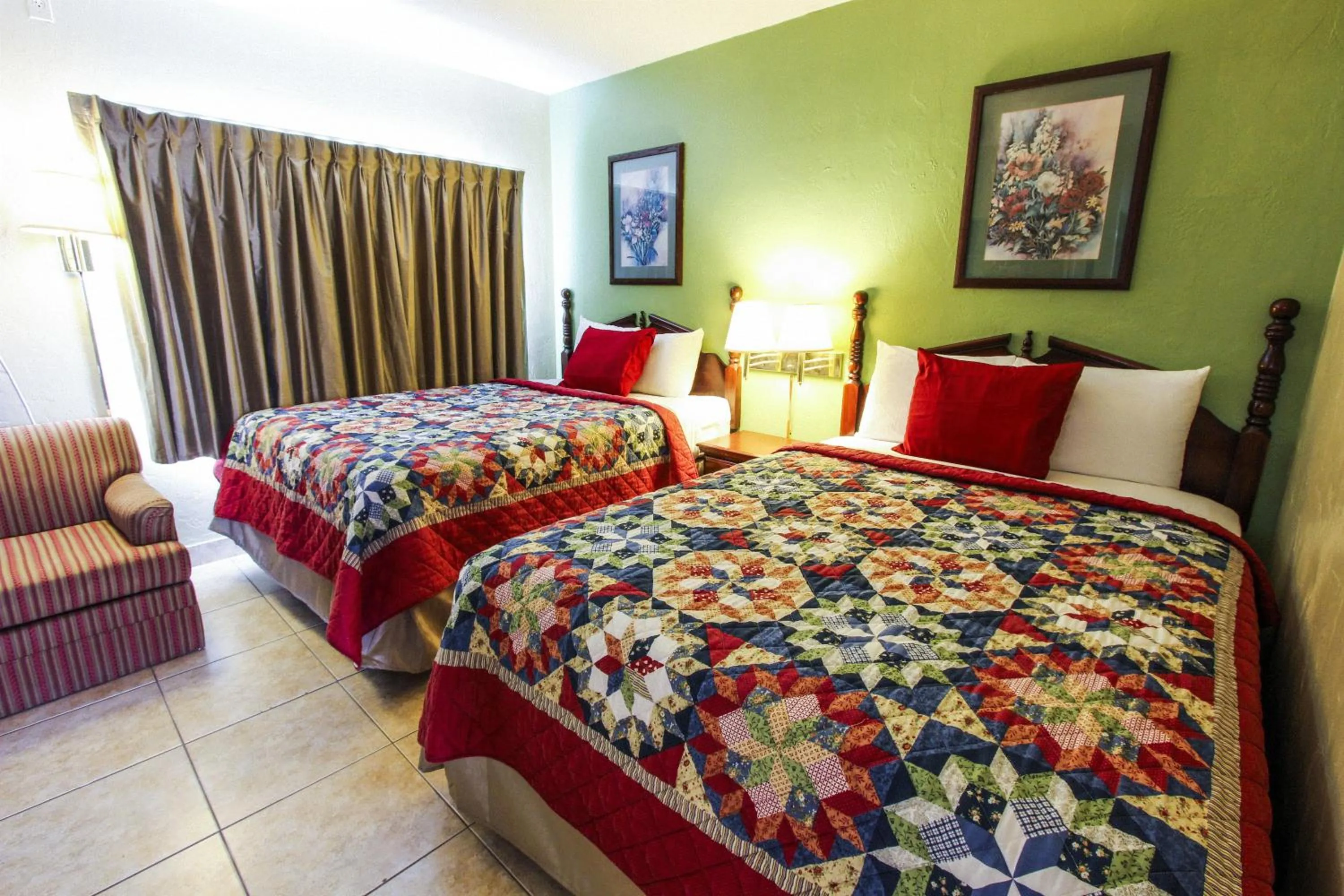 Bedroom, Bed in Oceans Beach Resort & Suites