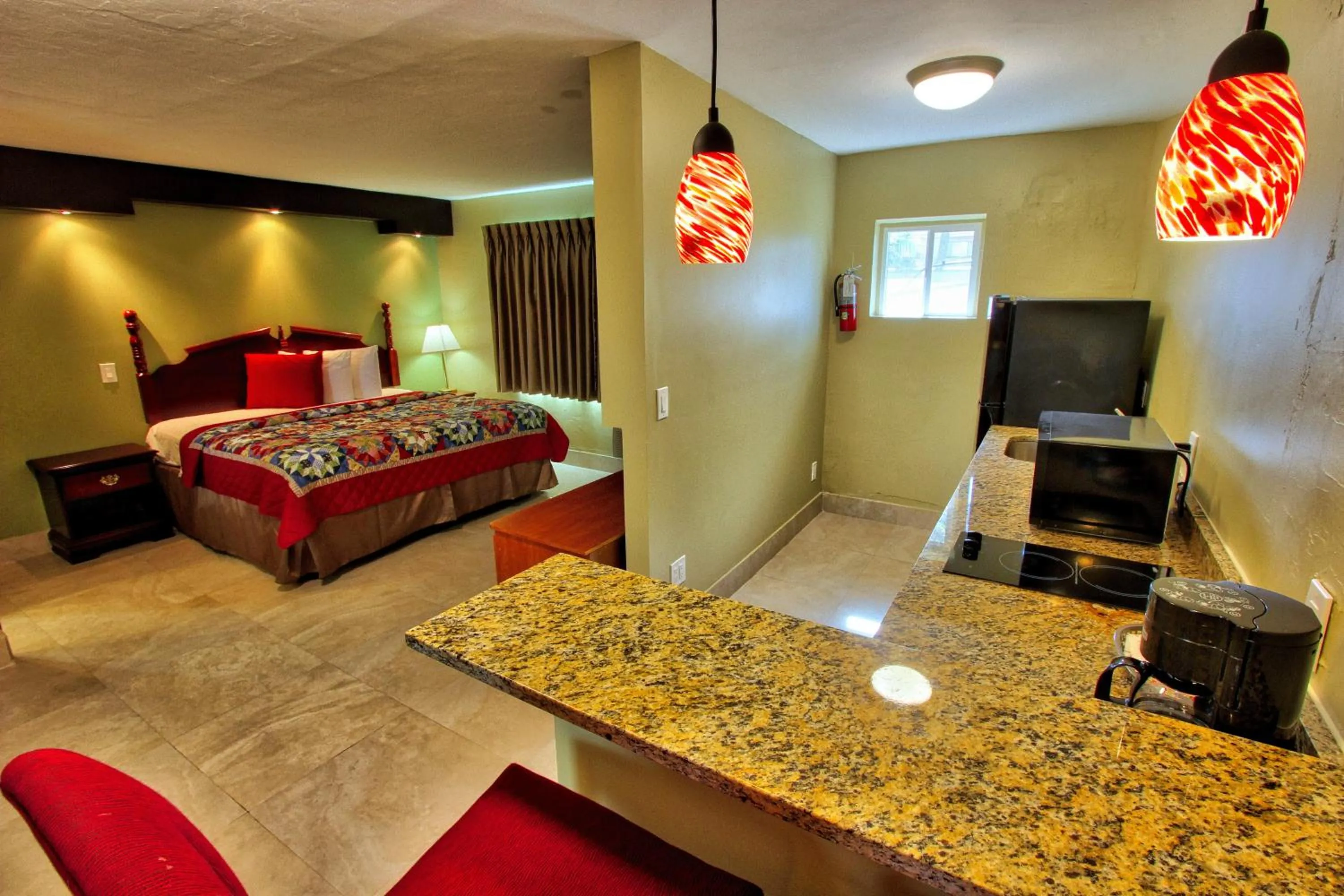 Bedroom, Bed in Oceans Beach Resort & Suites