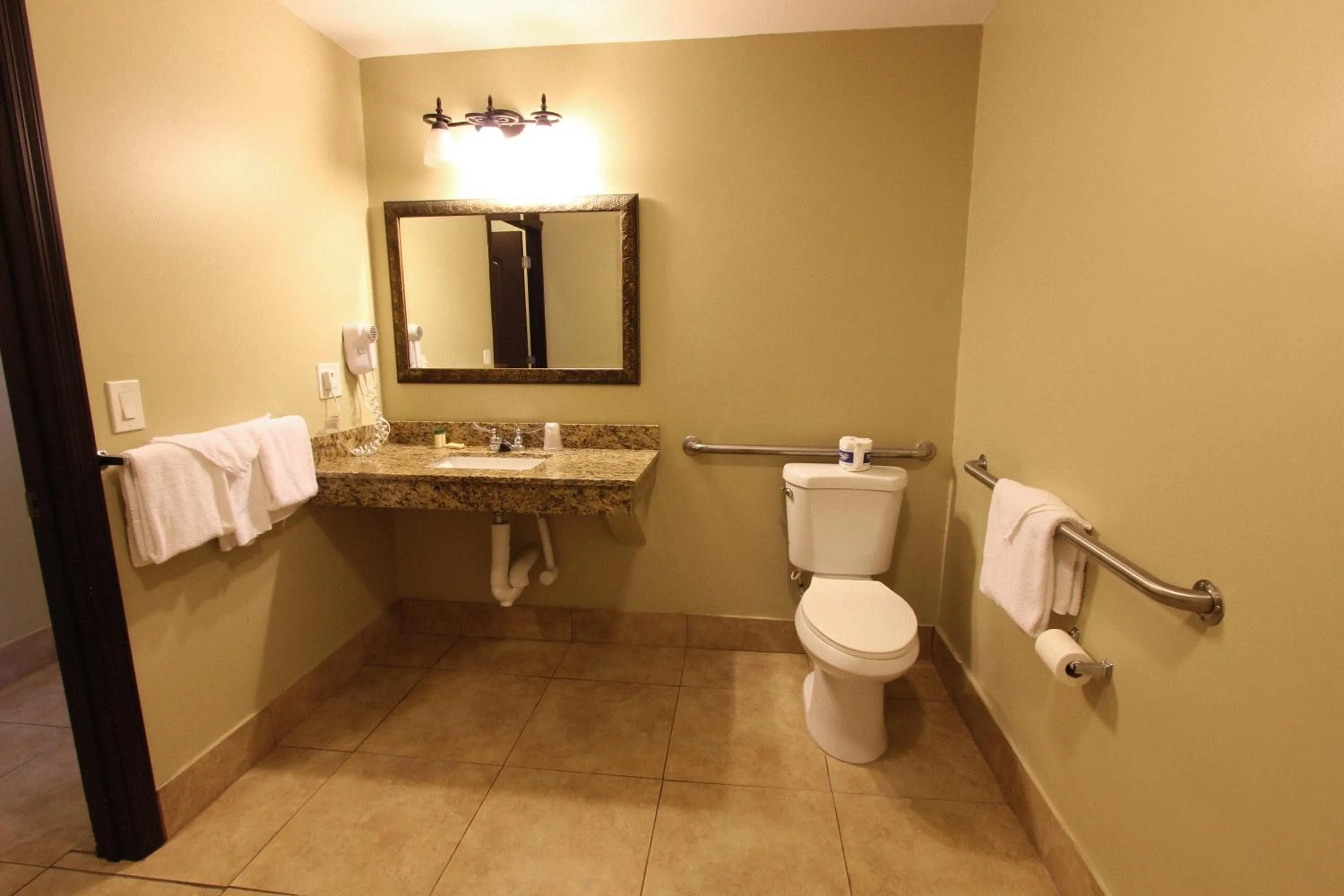Bathroom in Oceans Beach Resort & Suites