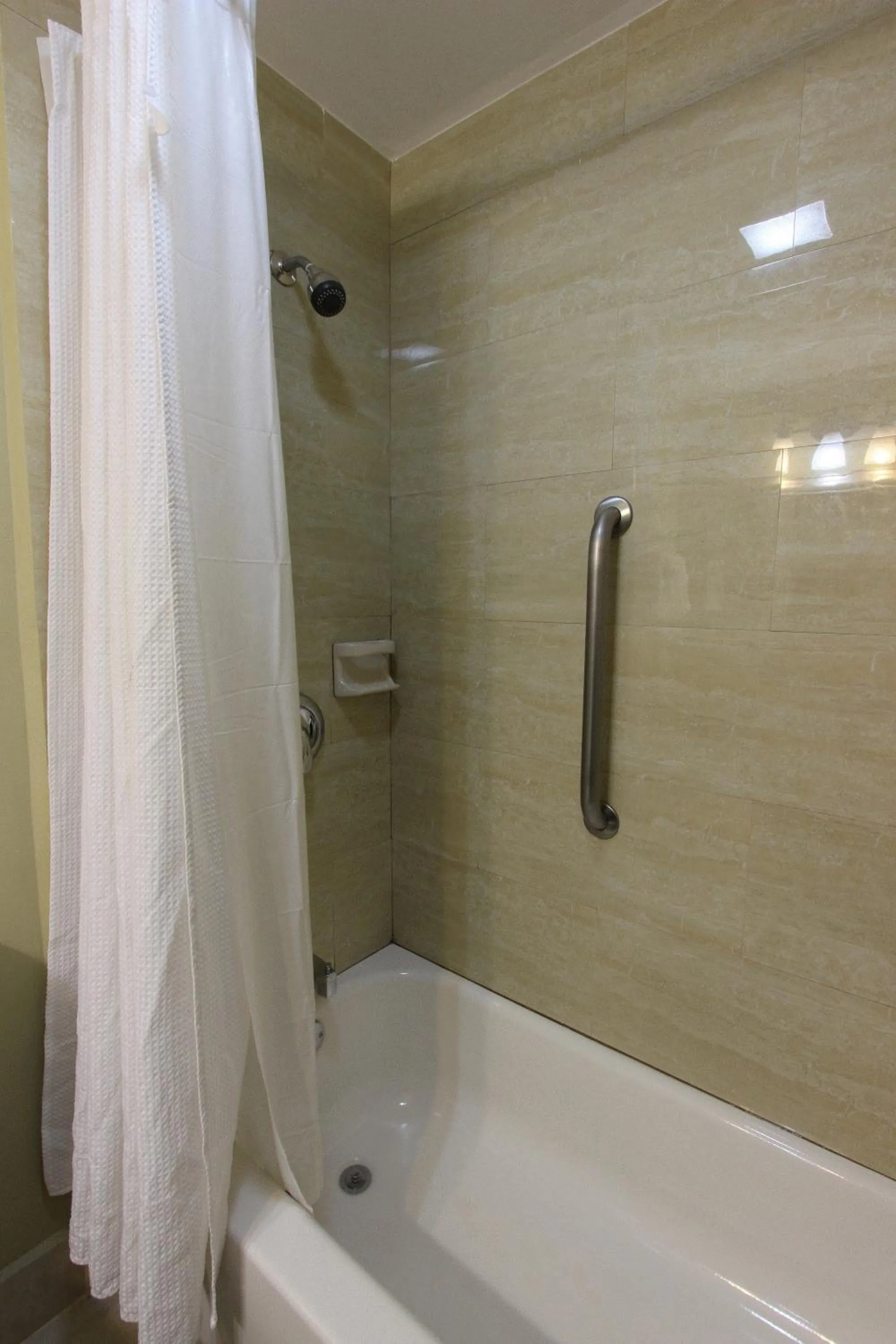 Bathroom in Oceans Beach Resort & Suites