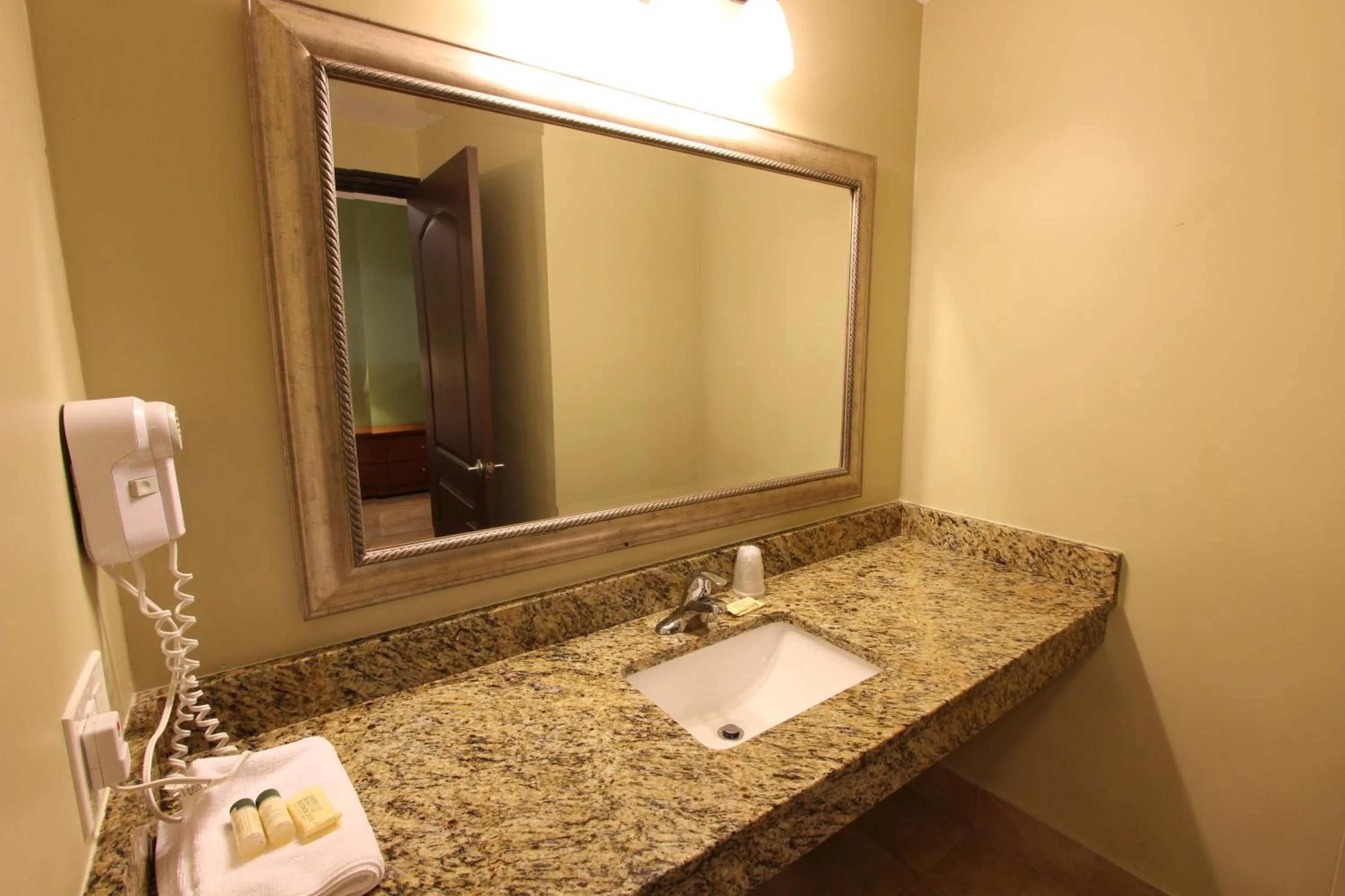 Bathroom in Oceans Beach Resort & Suites