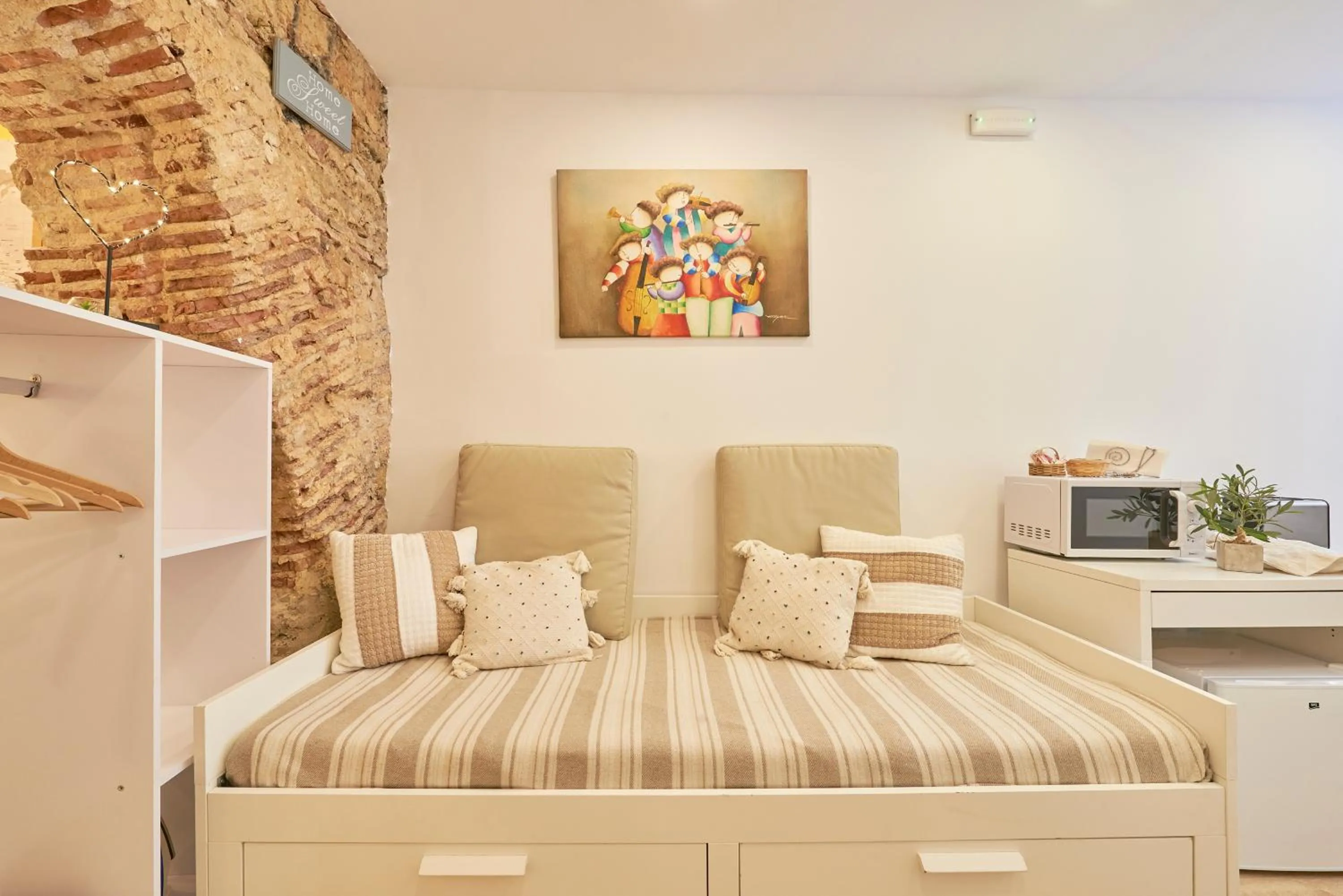 Living room, Bed in Lisbon Inn Bica Suites