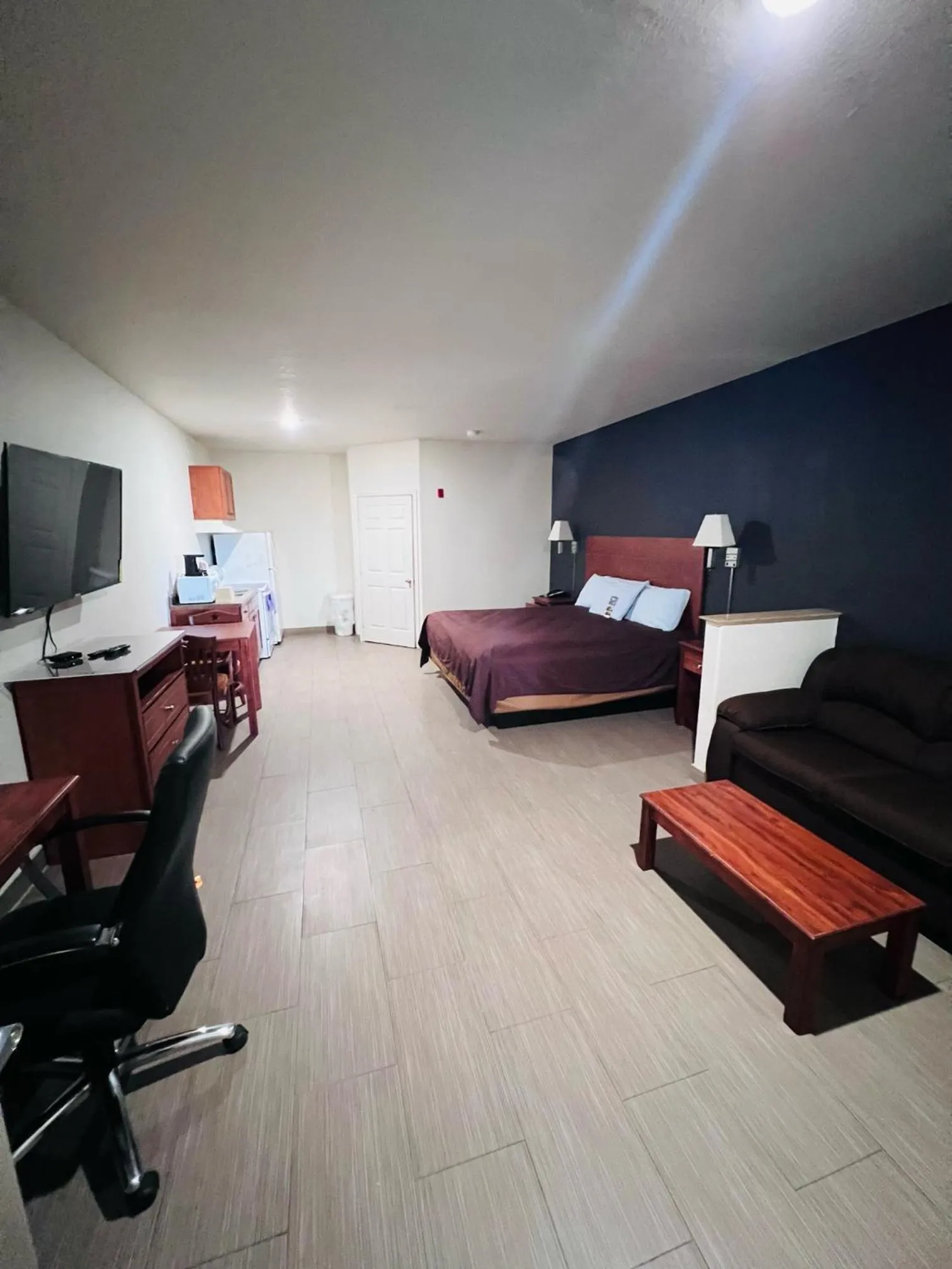 Bed in Lone Star Inn and Suites Victoria