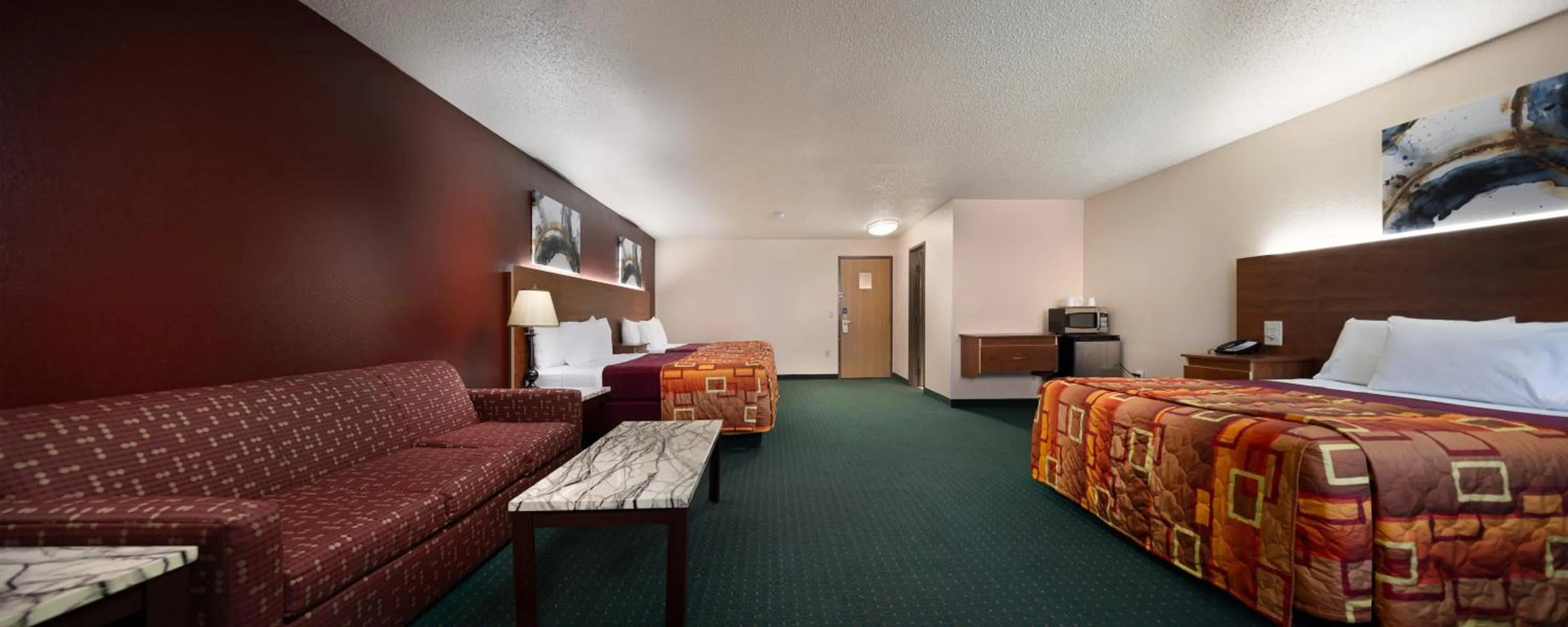 Bed in Grand Marquis Waterpark Hotel & Suites