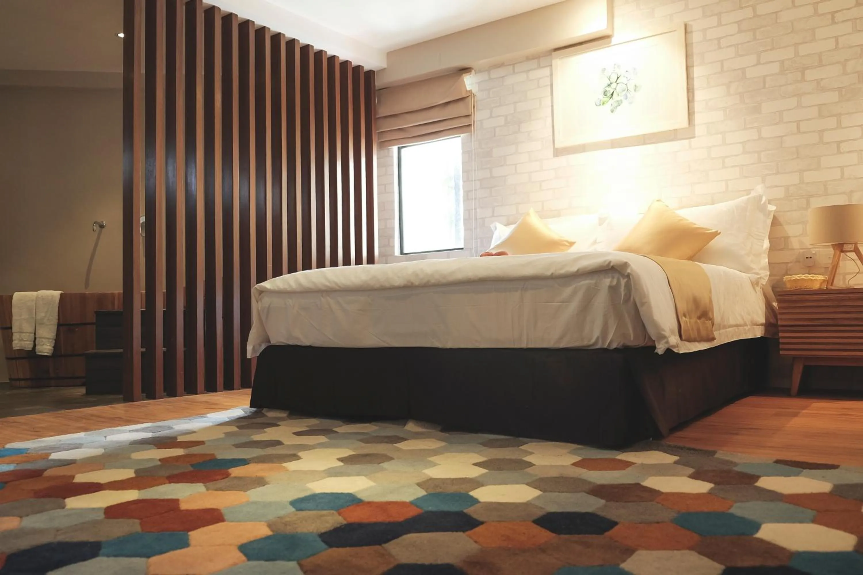 Bed in Sojourn Spa Hotel