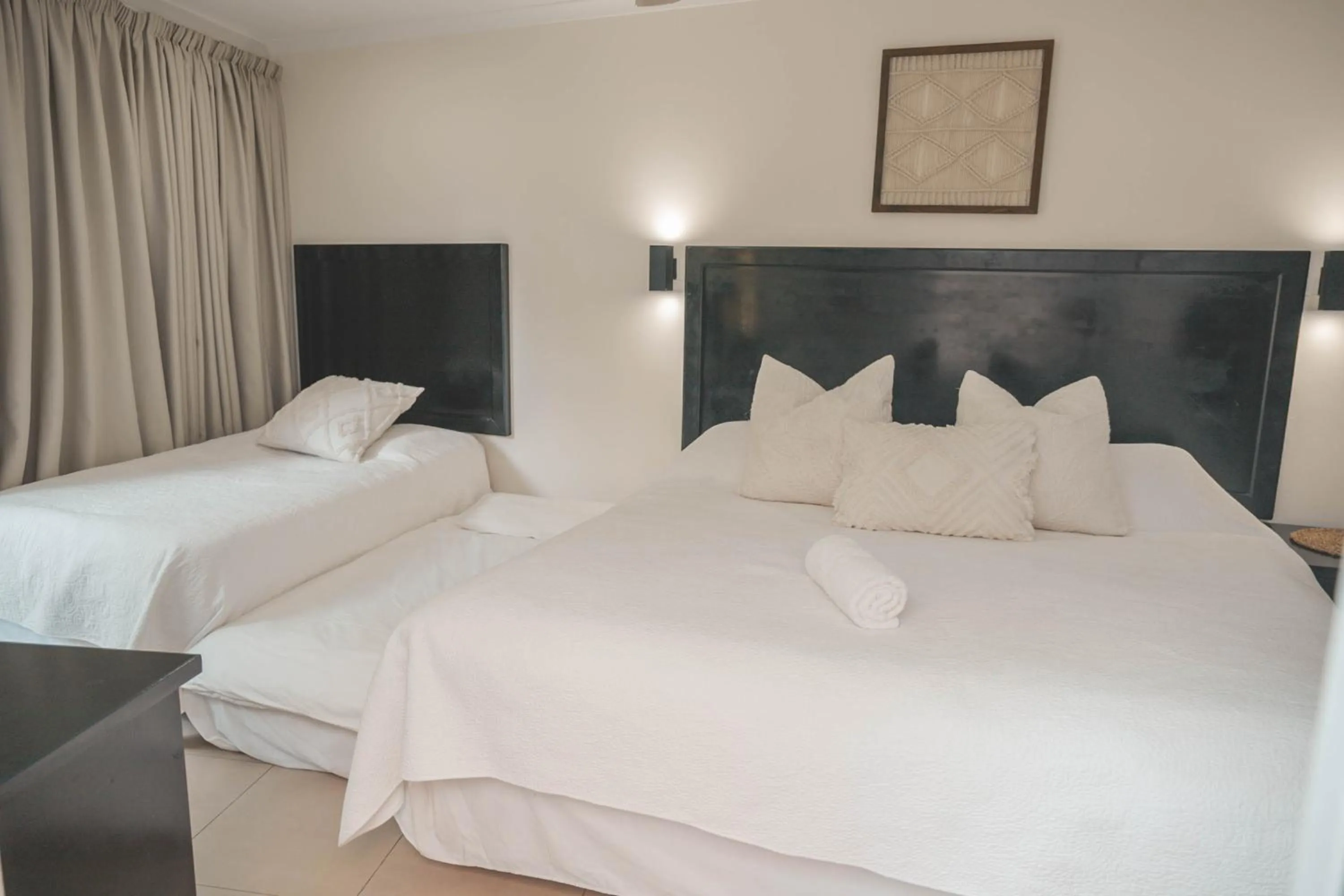 Bed in Beside Still Waters Boutique Hotel