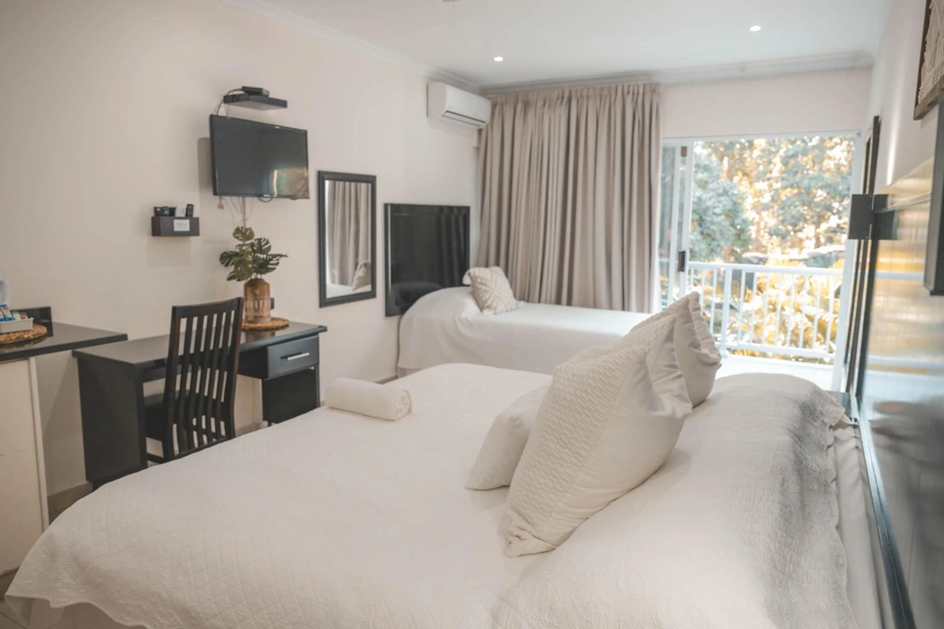 Bed in Beside Still Waters Boutique Hotel