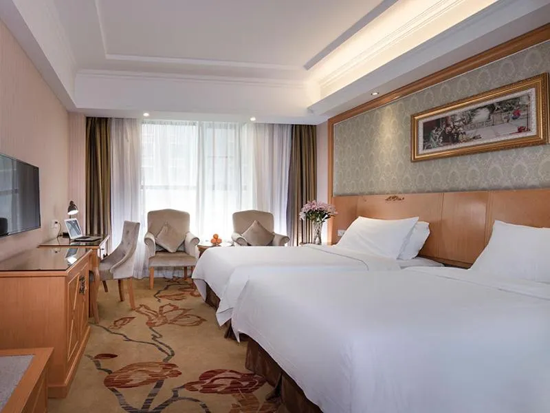 Bed in Vienna Hotel Yueyang Huarong Avenue