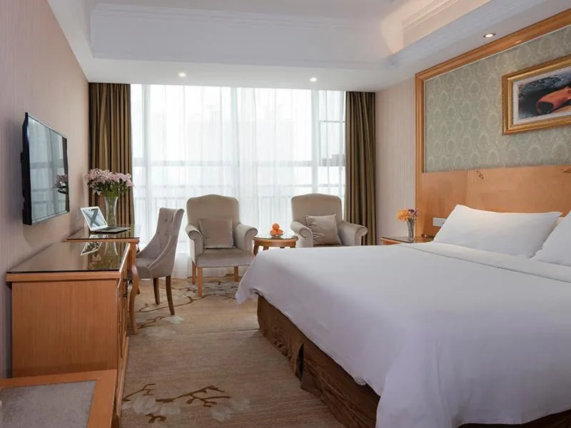 Bed in Vienna Hotel Yueyang Huarong Avenue