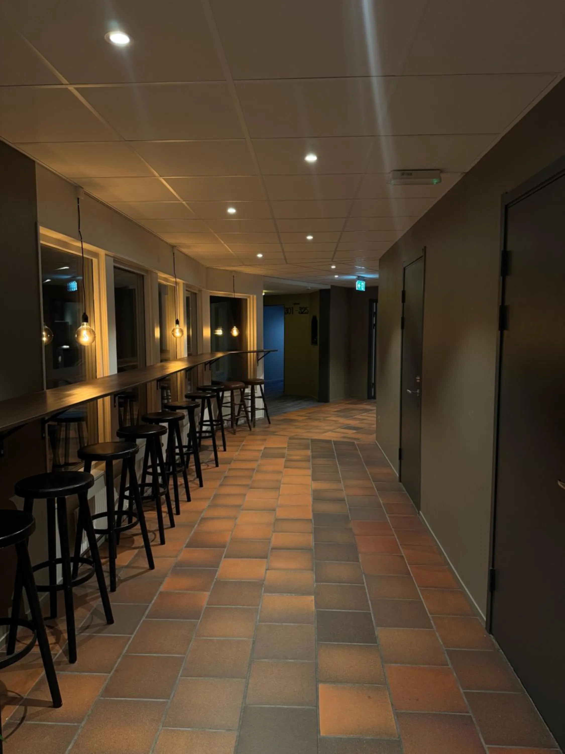 Communal lounge/ TV room in First Camp Moraparken Hotel